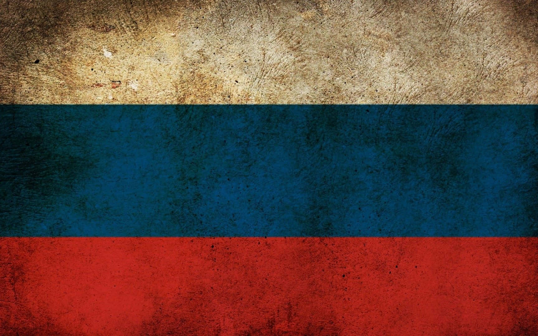 Russia 桌布 壁紙 — 一面飽經風霜的俄羅斯國旗，帶有紋理的紅、藍、白條紋，顯示出歲月和磨損的痕跡。