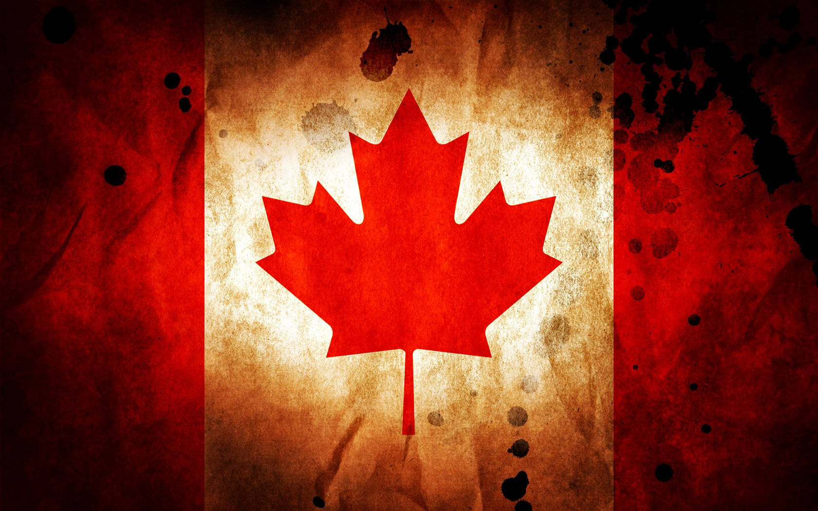 Canada Flag 桌布 壁紙 — 一面飽經風霜的加拿大國旗，大膽的紅色楓葉位於帶有紋理的米色背景中央，兩側是紅色條紋和飛濺的黑色墨水。