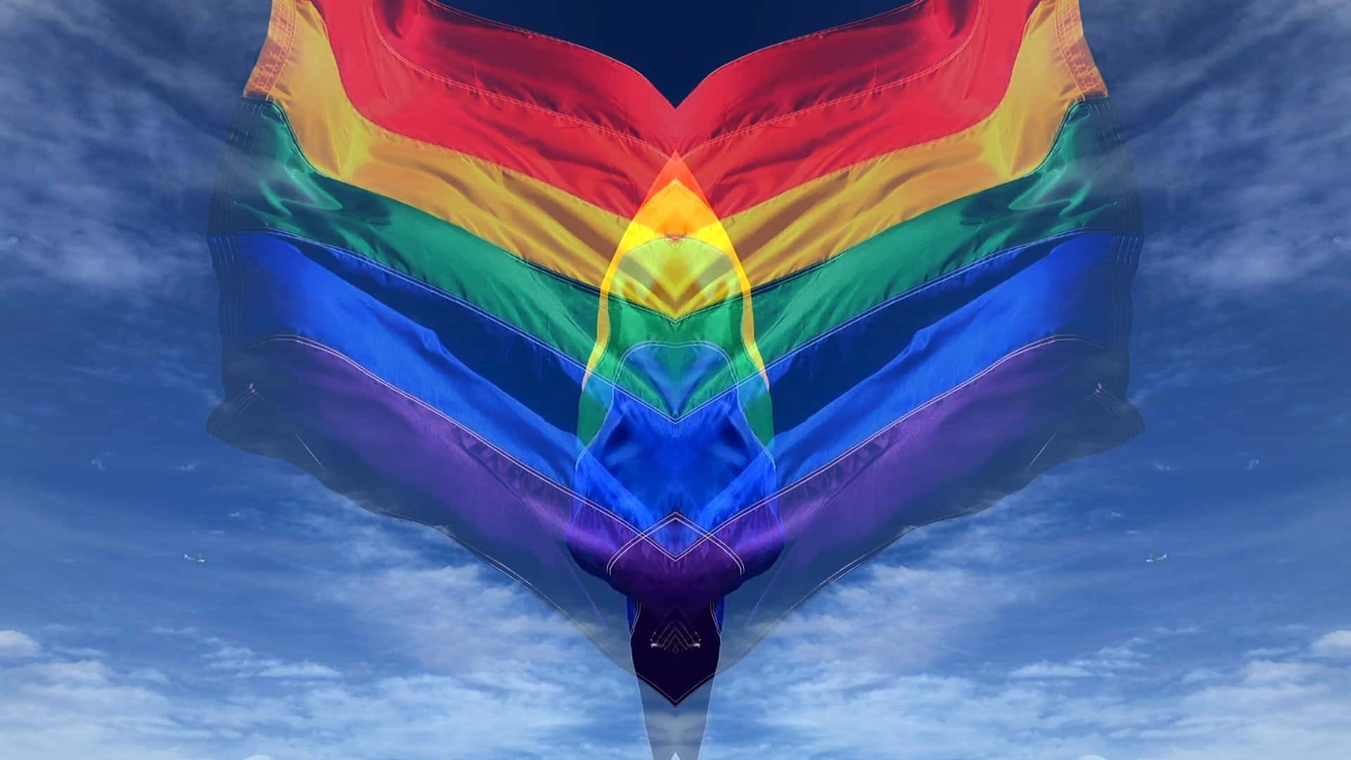 Pride Zoom 桌布 壁紙 — 一面鮮豔的彩虹心形旗幟在藍天白雲中飄揚。