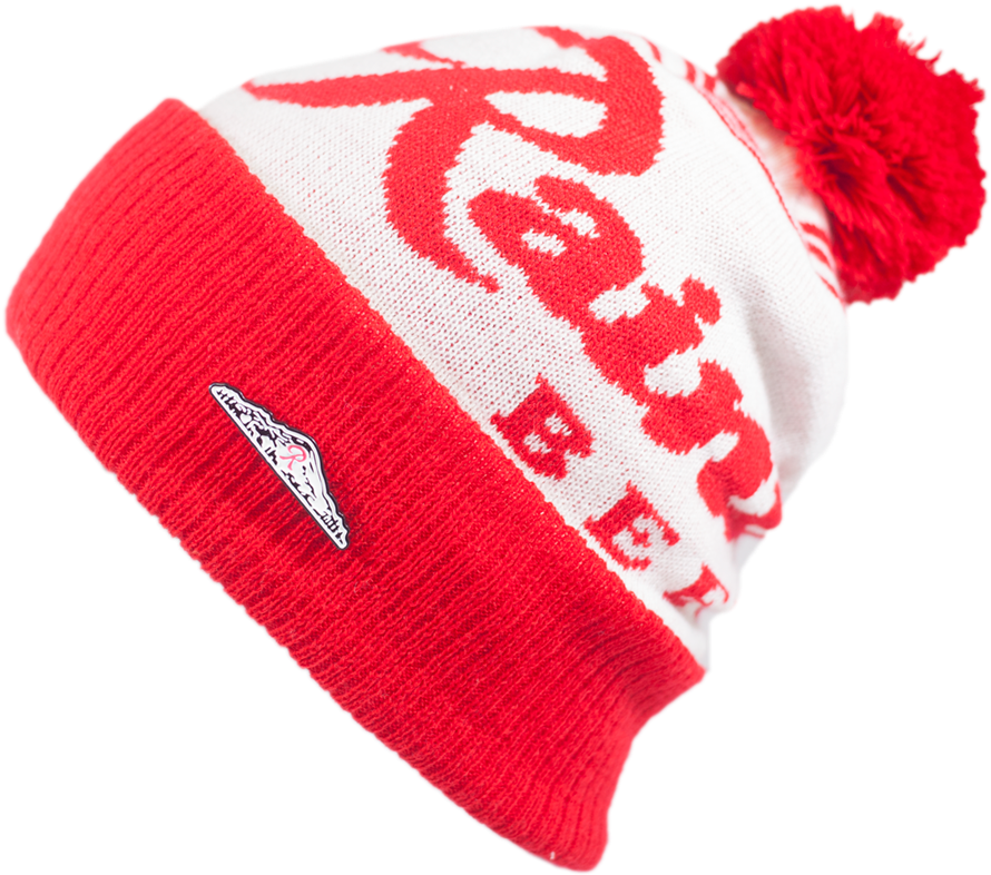 Beanie 桌布 壁紙 — 一頂充滿活力的紅白針織無邊帽，帶有毛絨絨球和袖口上的小型金屬標誌。