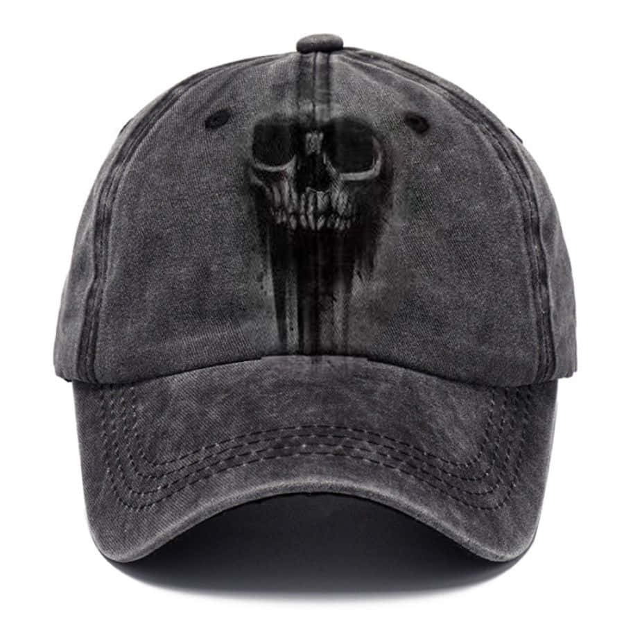 Hat 桌布 壁紙 — 一頂深灰色復古棒球帽，正面中央有一個褪色的骷髏圖案。