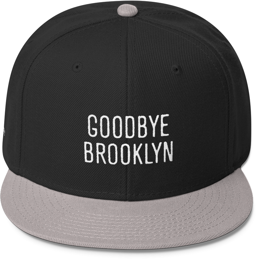再見 桌布 壁紙 — 一頂黑色和灰色的 snapback 帽，上面有白色刺繡文字 goodbye brooklyn，背景簡潔。