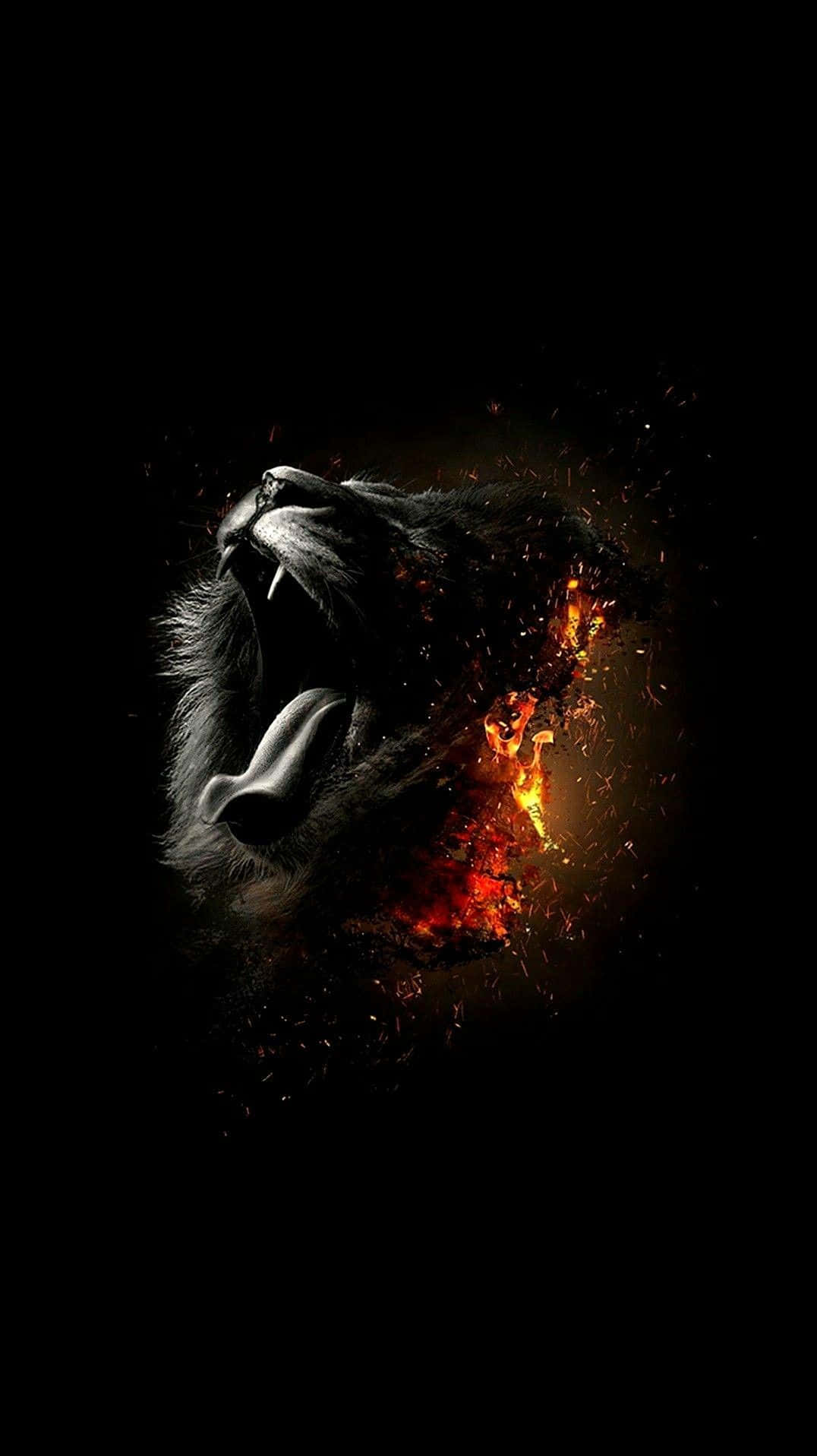 Black Lion 桌布 壁紙 — 一頭咆哮的獅子頭在漆黑背景下爆發出熾熱的火花。