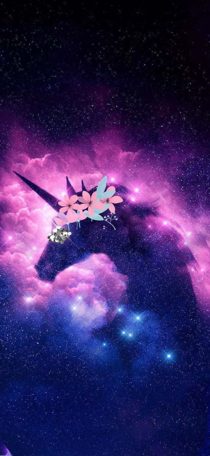一頭飾有花朵的獨角獸漂浮在繁星點點的宇宙星雲中。 — 可愛的銀河動圖 壁紙