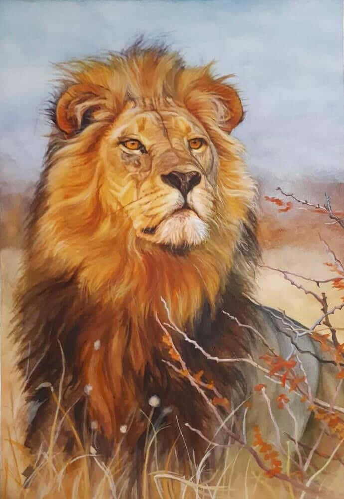 Lion Head 桌布 壁紙 — 一頭雄偉的雄獅，有著濃密的金色鬃毛，在柔和天空下透過稀疏的秋枝凝視著。