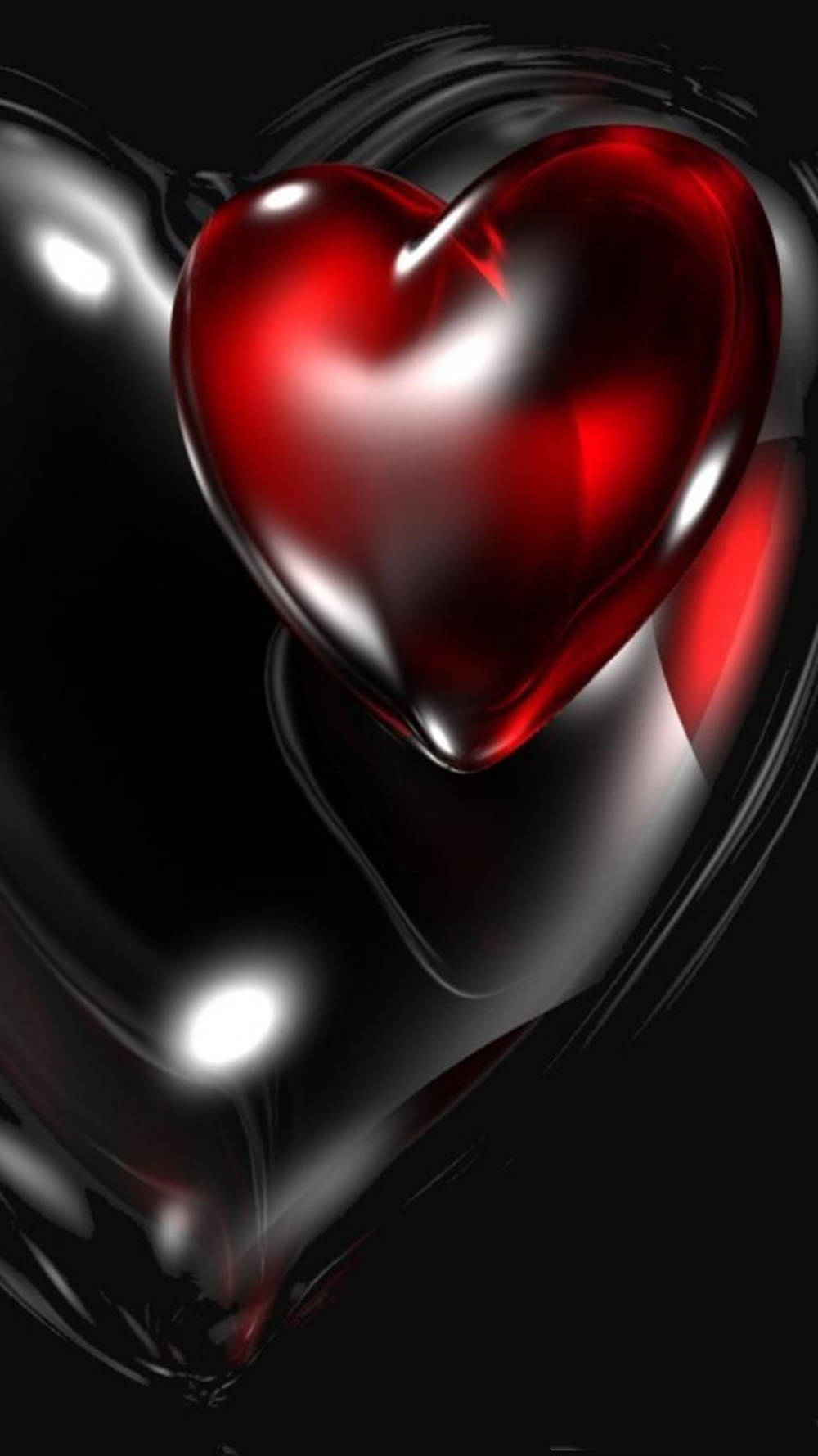 Heart 桌布 壁紙 — 一顆亮面紅心在旋轉的黑色背景上閃耀，帶有反射高光。