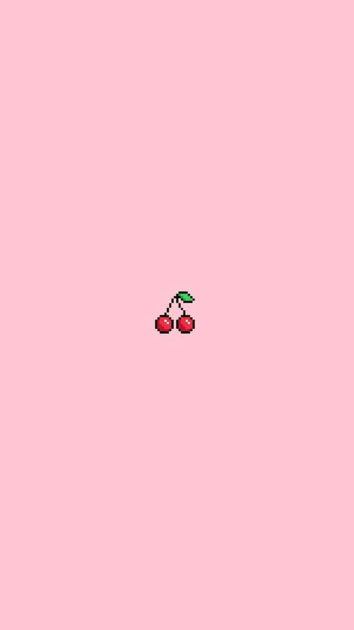 Simple Pink 桌布 壁紙 — 一顆像素化的櫻桃，帶有綠色葉子，位於柔和的粉紅色背景中央。