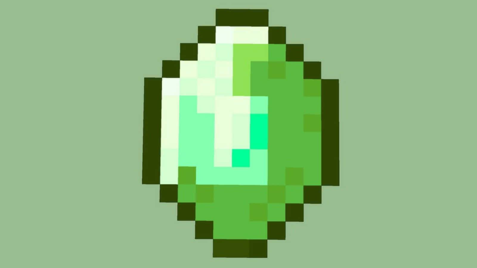 Minecraft Emeralds 桌布 壁紙 — 一顆像素化的綠色寶石，帶有漸變色調，置於柔和的鼠尾草色背景上。