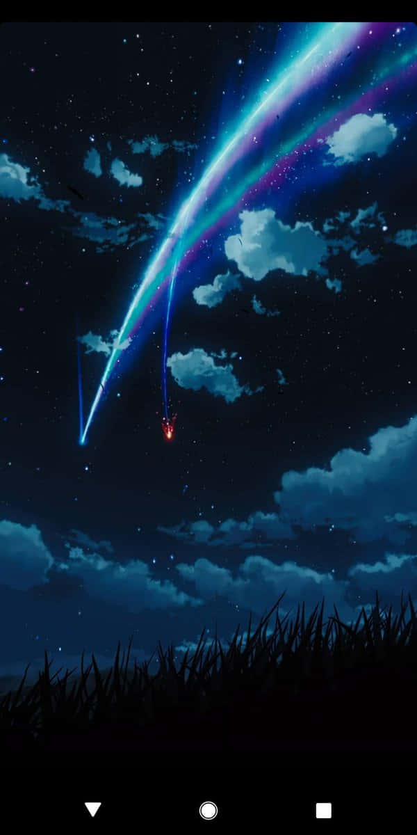 桌布 壁紙 — 一顆充滿活力的流星劃過草叢剪影上方的星空，留下藍色和紫色的發光軌跡。