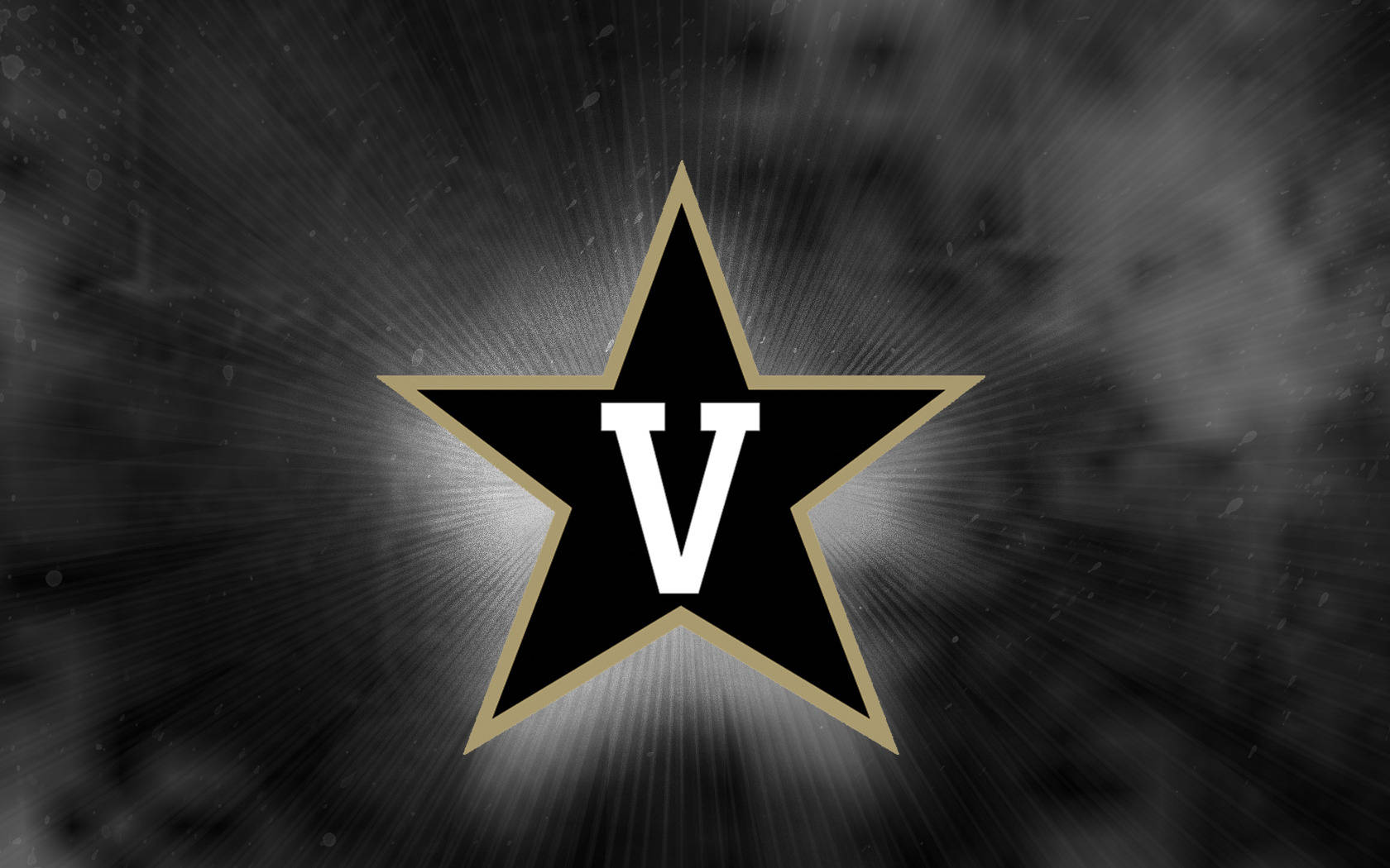 標誌 桌布 壁紙 — 一顆大膽的黑色星星，帶有金色邊框和白色「V」形中心，在煙霧般的灰色背景上散發光芒。
