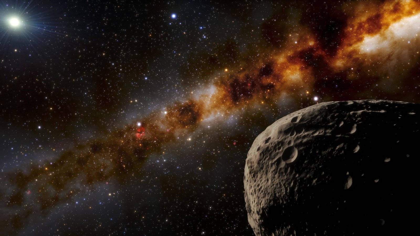 太空 桌布 壁紙 — 一顆巨大的隕石坑小行星佔據前景，背景是發光的星雲和遙遠恆星組成的鮮豔宇宙景象。
