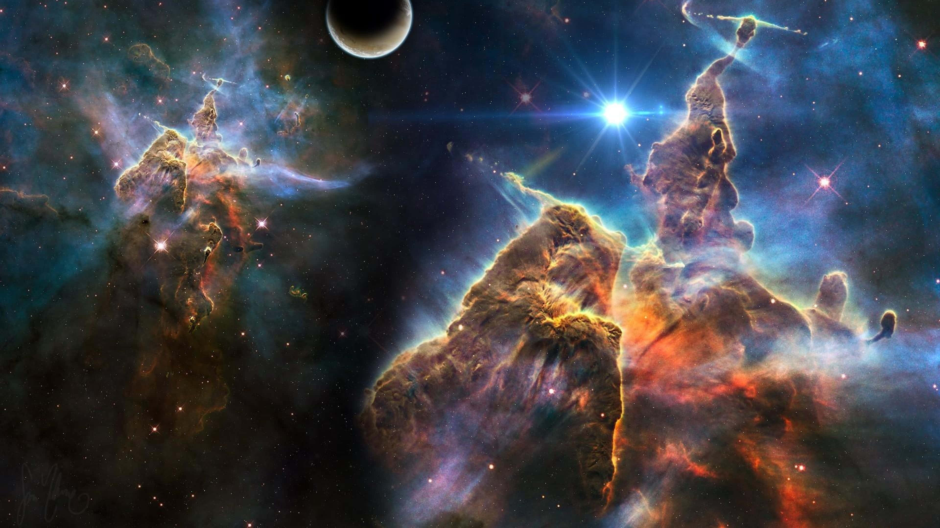 一顆恆星與一顆行星的太空影像 壁紙