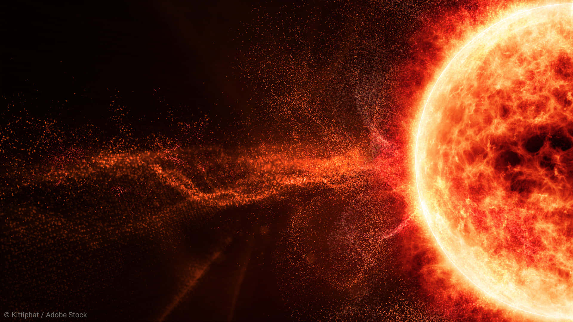 太陽 桌布 壁紙 — 一顆熾熱的太陽爆發，發出熾熱的太陽耀斑和粒子，流經黑暗的宇宙。