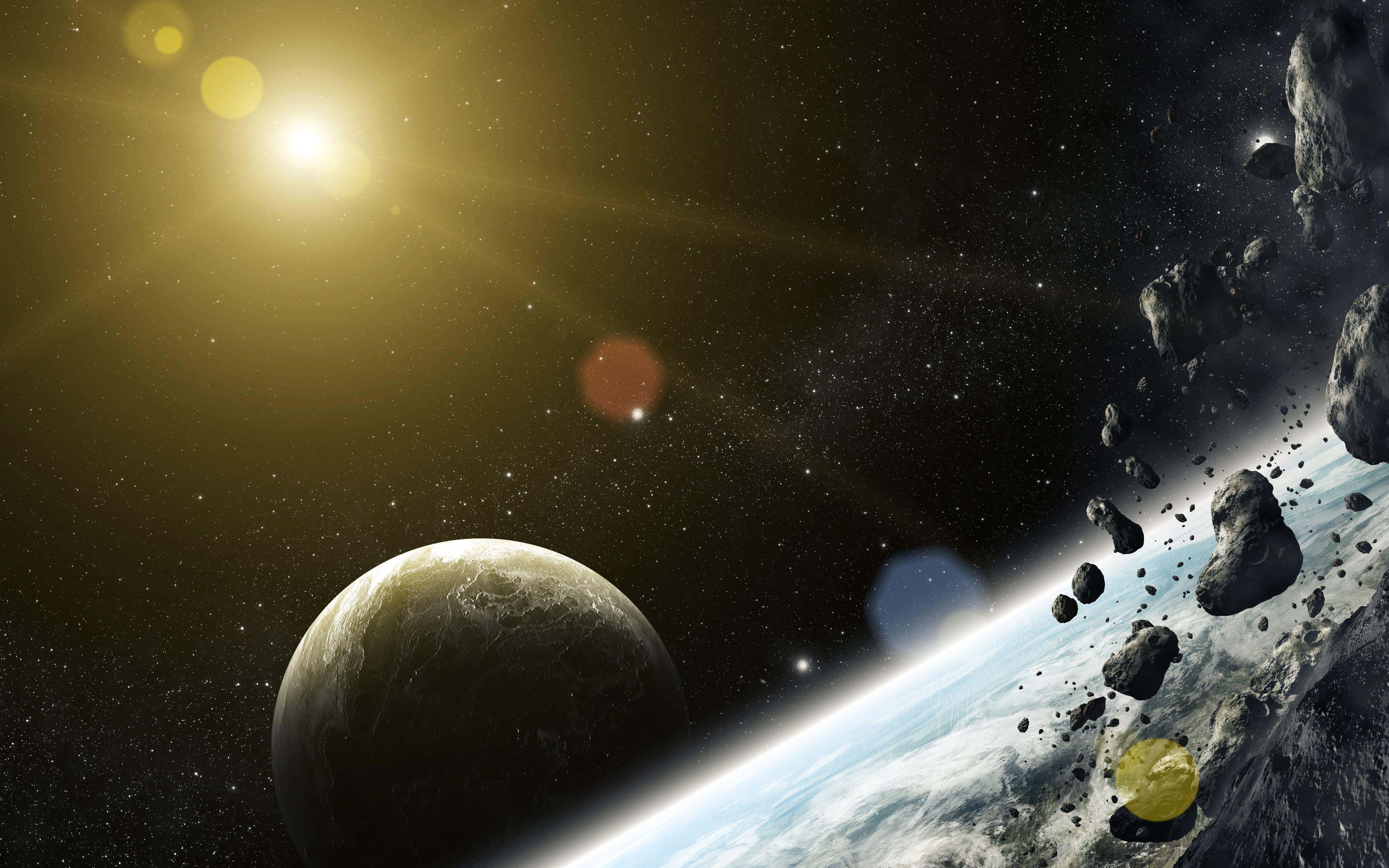 Asteroid 桌布 壁紙 — 一顆發光的太陽照亮了一顆行星和小行星帶，背景是繁星點點的宇宙，帶有鏡頭光暈。