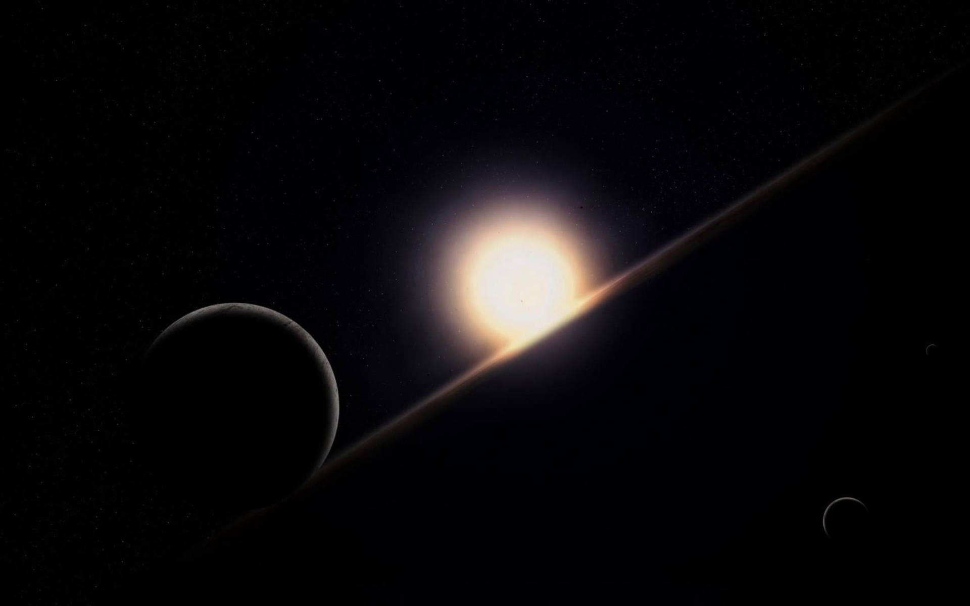 Black Planet 桌布 壁紙 — 一顆發光的星星在行星和廣闊環系統後面，在星場中閃耀。