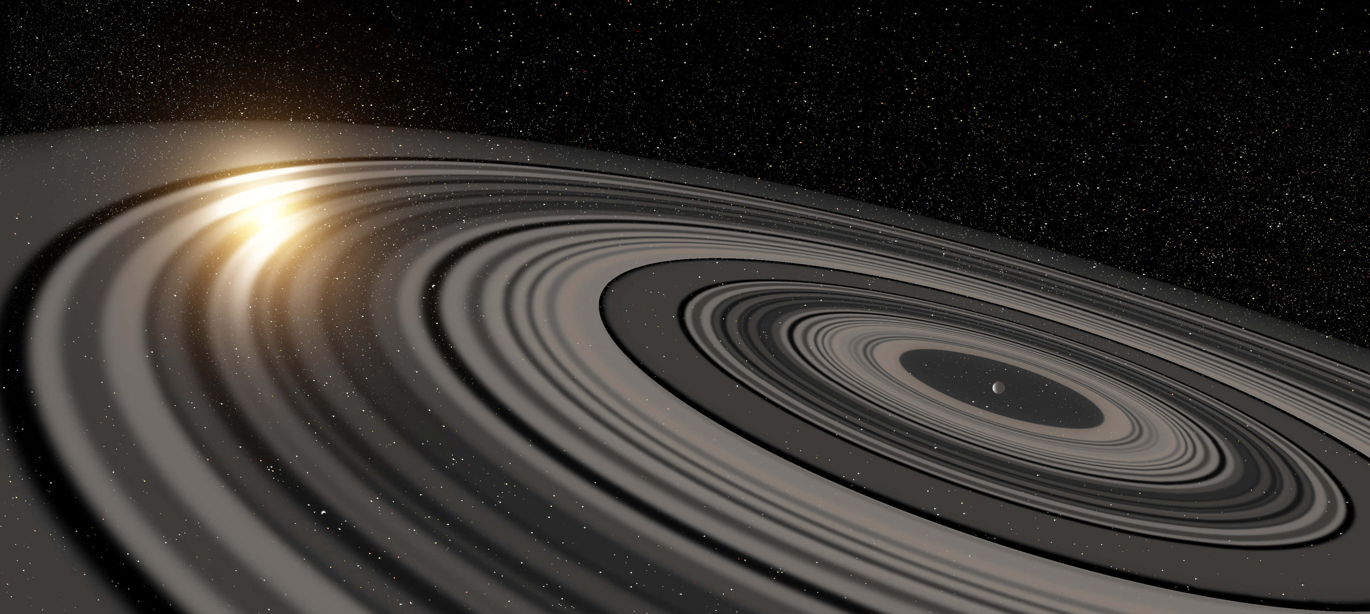 土星 桌布 壁紙 — 一顆發光的星星照亮了廣闊星場中宇宙塵埃的同心環。