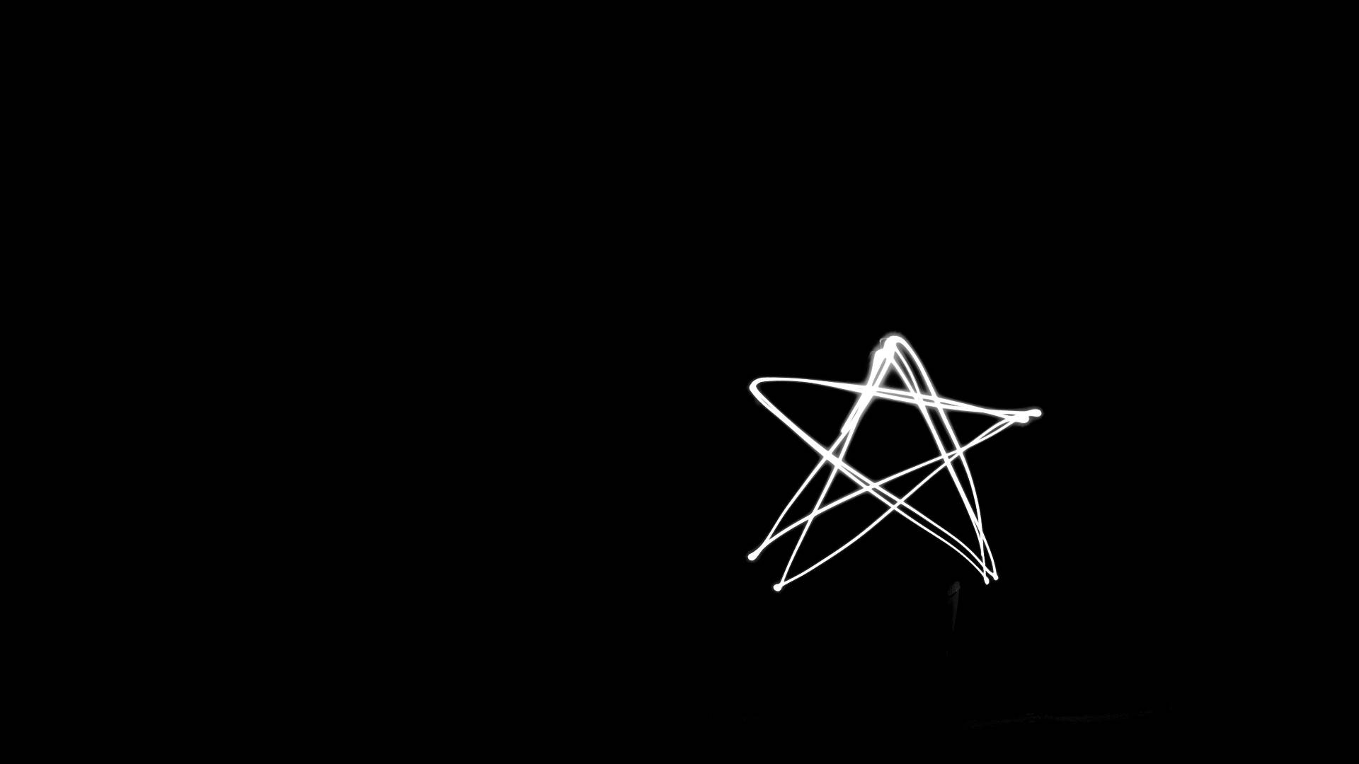 一顆白色星星，帶有光跡，繪製在黑色背景上。 — 星星動圖 壁紙