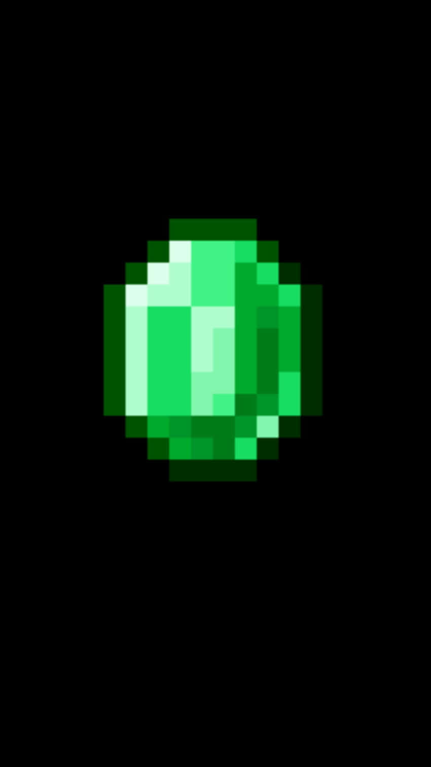 Minecraft Emeralds 桌布 壁紙 — 一顆發光的綠色像素化寶石，居中於黑色背景上，帶有明亮的高光。