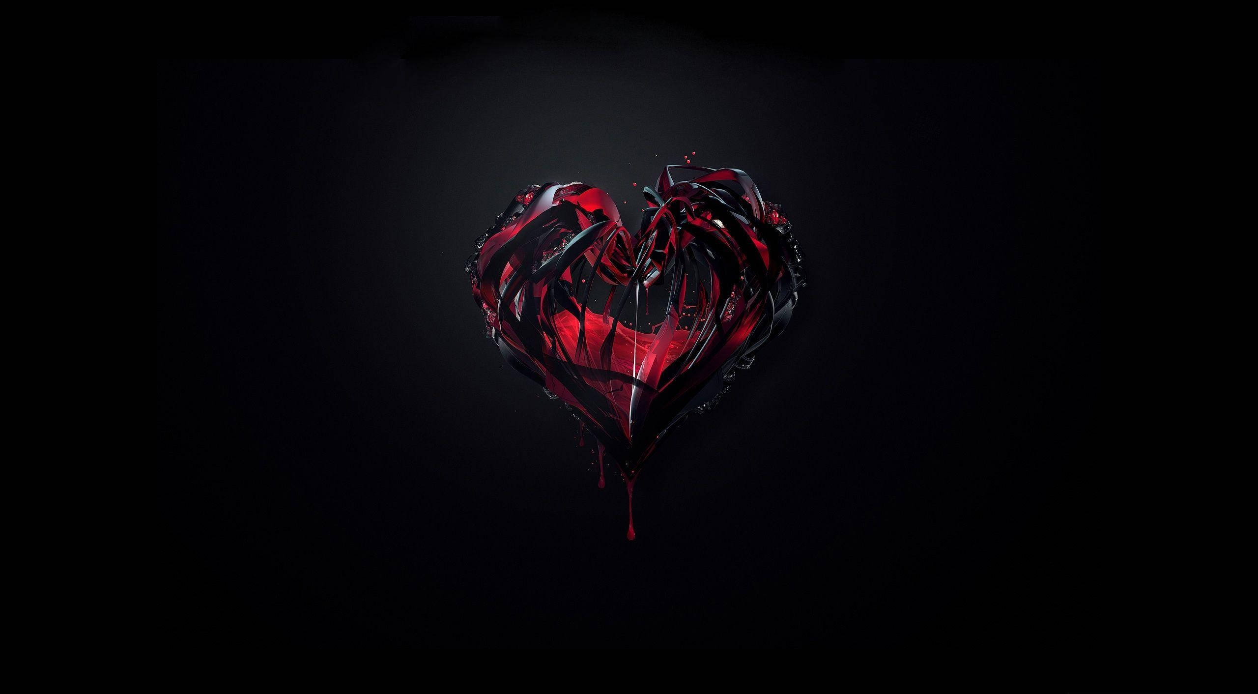 Blood 桌布 壁紙 — 一顆破碎的深紅色心臟滴著液體，在漆黑虛空中發光。