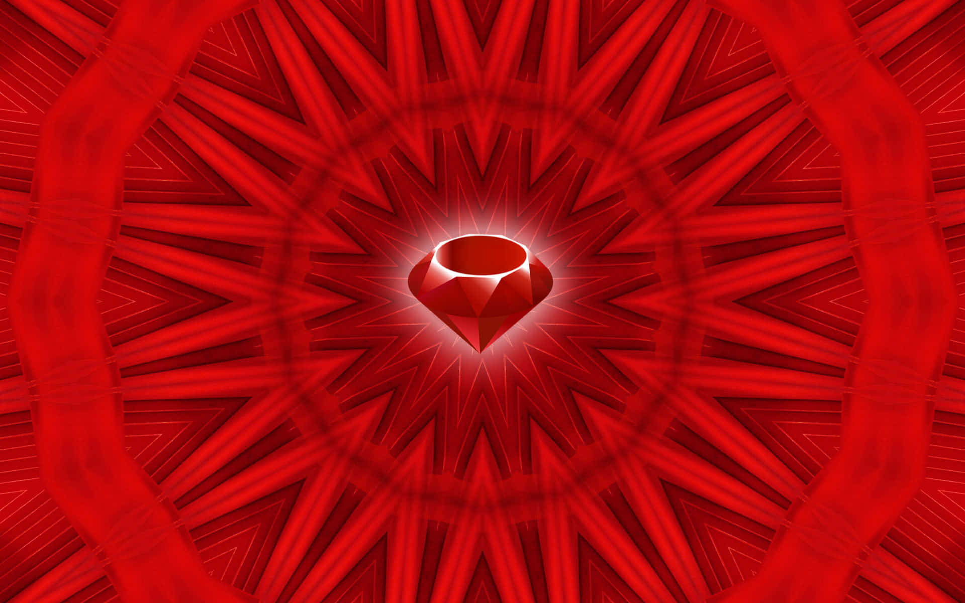 Ruby 桌布 壁紙 — 一顆閃耀的紅色鑽石在對稱幾何圖案的中心發光，圖案以深紅色調向外輻射。