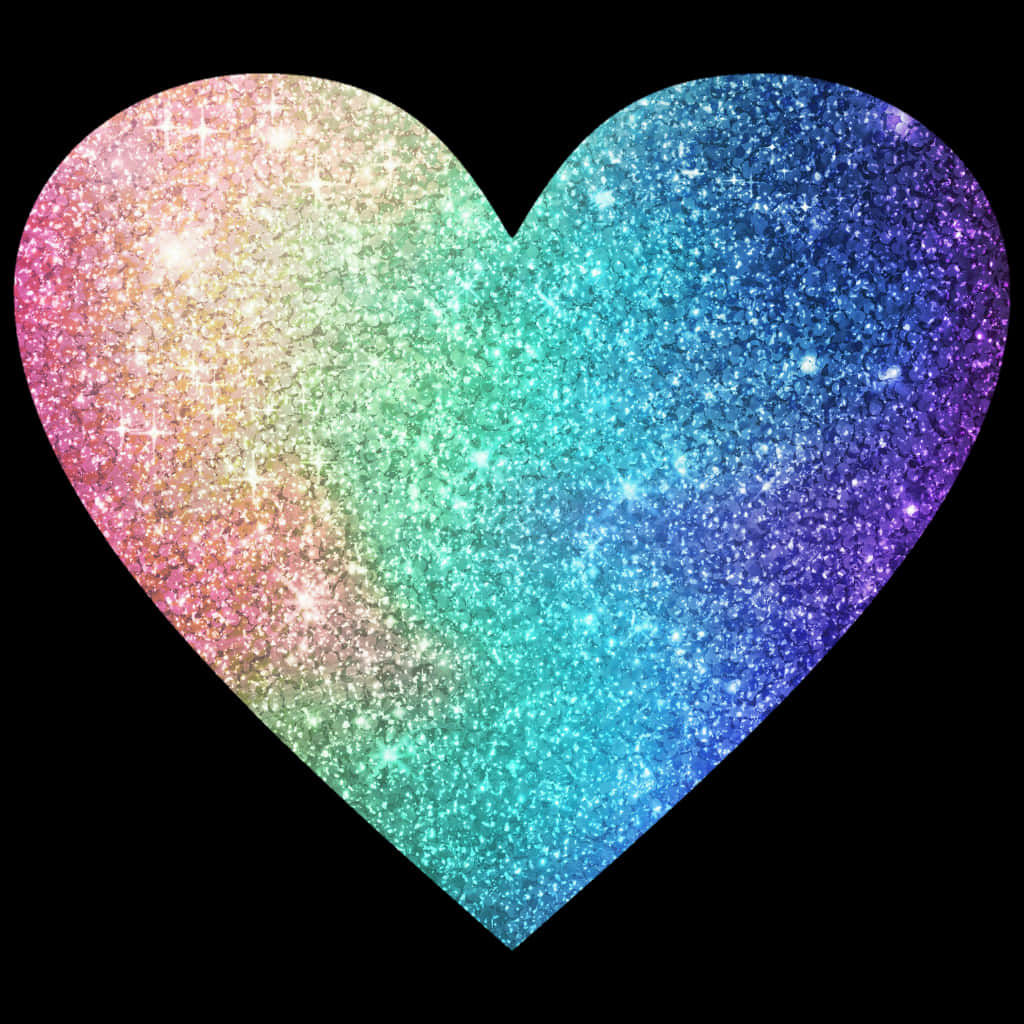 Rainbow Heart 桌布 壁紙 — 一顆閃閃發光的彩虹心在黑色背景上散發出從粉紅到紫色的閃爍色彩。