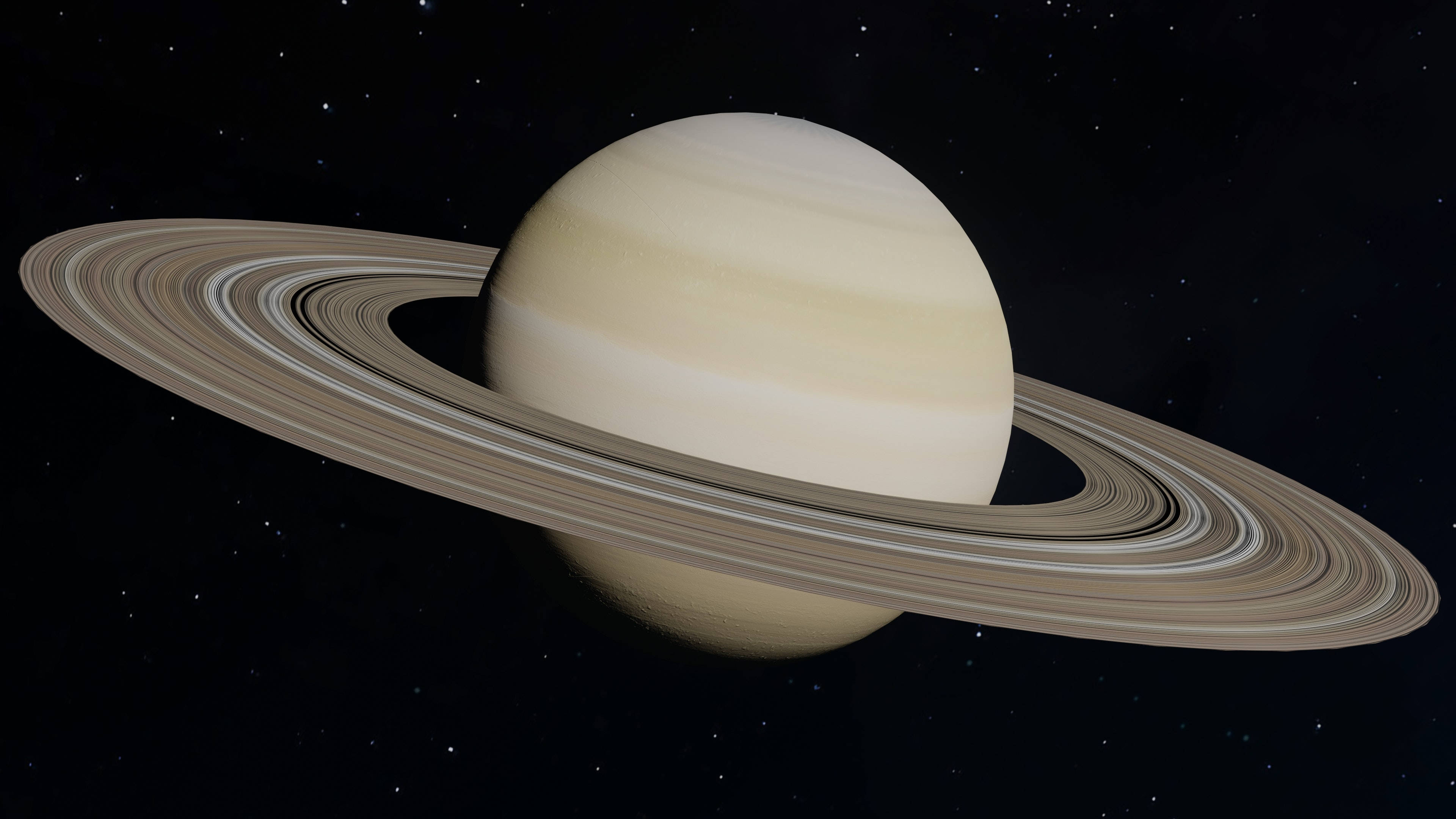 土星 桌布 壁紙 — 一顆雄偉的土星，帶有複雜的環，在星空宇宙背景下柔和發光。