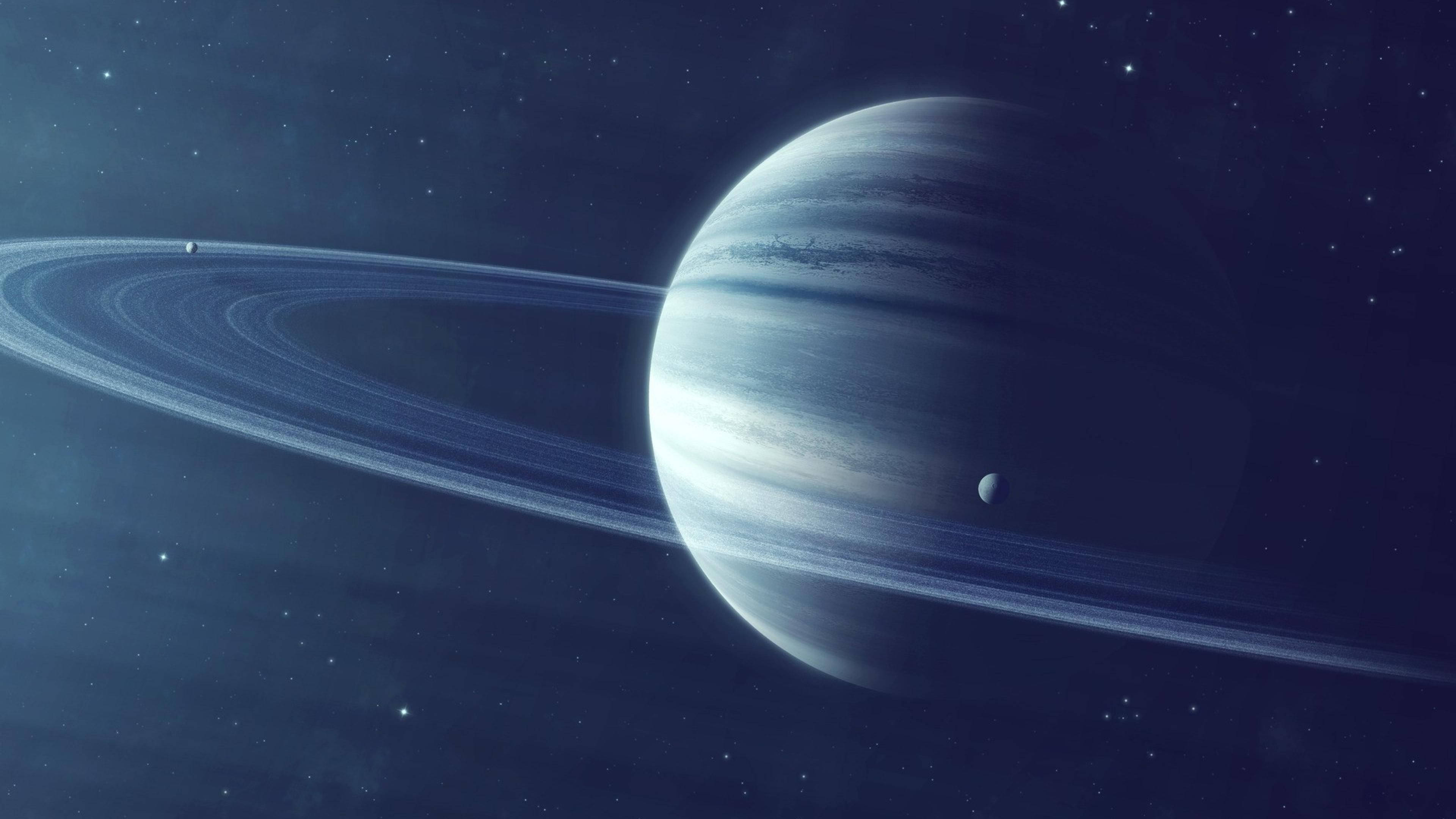 土星 桌布 壁紙 — 一顆雄偉的氣態巨行星，帶有旋轉的條紋和突出的環系統，在佈滿星星的宇宙背景下柔和地發光。