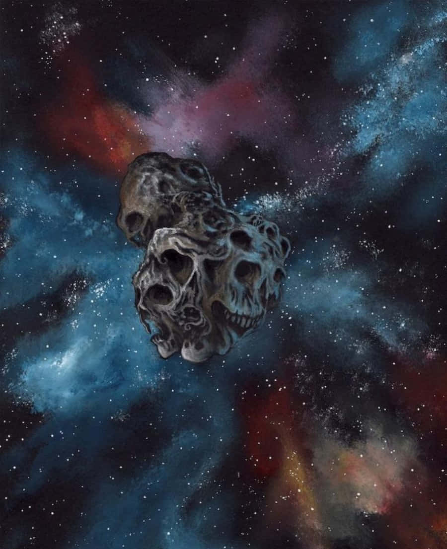 Scary Space 桌布 壁紙 — 一顆骷髏形狀的小行星在充滿藍色、紅色和紫色的 vibrant 宇宙星雲中飄浮，點綴著星星。