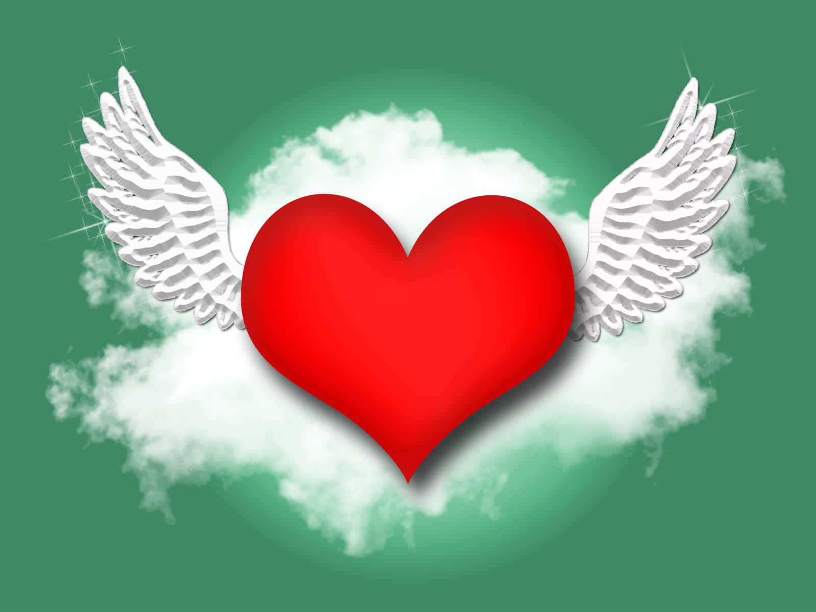 Love Heart 桌布 壁紙 — 一顆鮮紅的心臟帶有白色天使翅膀，漂浮在蓬鬆的雲朵中，背景是帶有閃爍高光的青綠色天空。