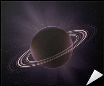 Ringed Planet 桌布 壁紙 — 一顆黑暗的行星帶有發光的環，在繁星點點的宇宙背景中散發光芒。