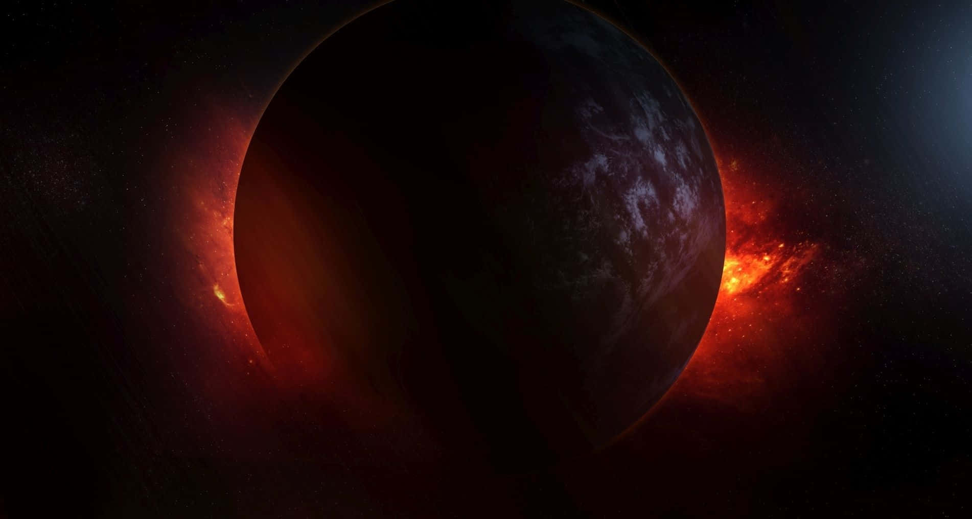 Red Space 桌布 壁紙 — 一顆黑暗的行星被一個在深空中散發著紅、橙、黑色調的熾熱星雲所遮蔽。