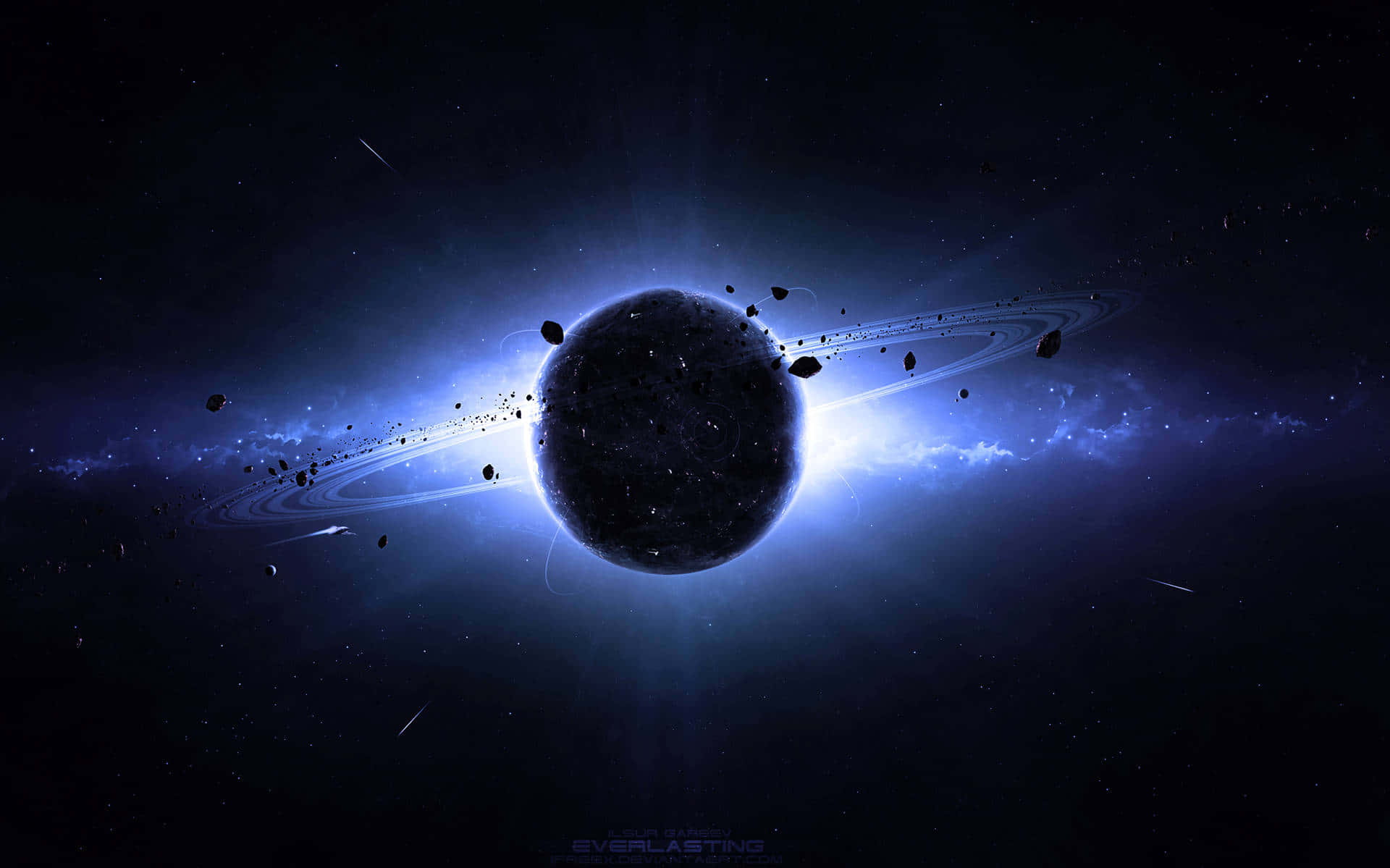 土星 桌布 壁紙 — 一顆黑暗行星，帶有發光的藍色光環和漂浮的小行星，沐浴在宇宙光中，背景是繁星點點的虛空。