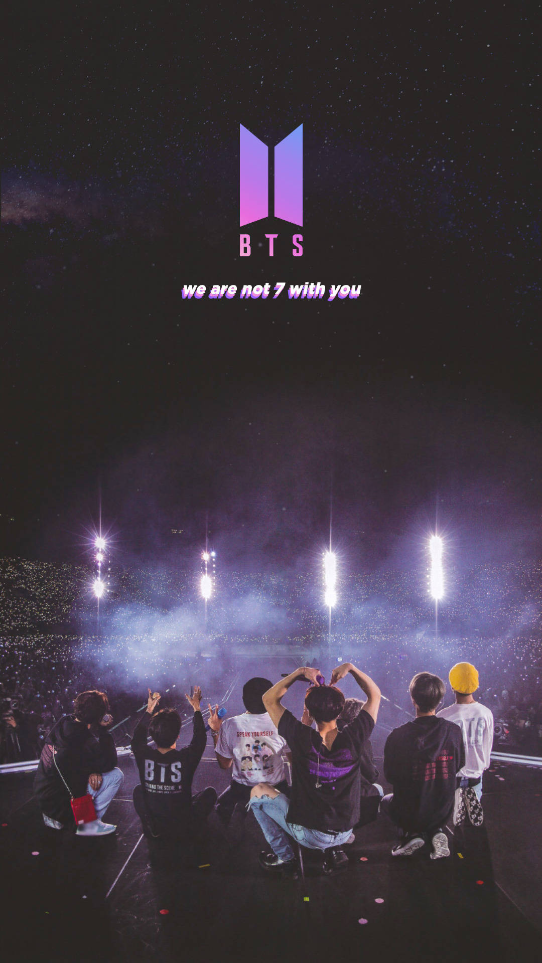 BTS成員坐在舞台上，星空下閃爍的燈光和飄落的五彩紙屑。 — BTS ARMY GIF 壁紙