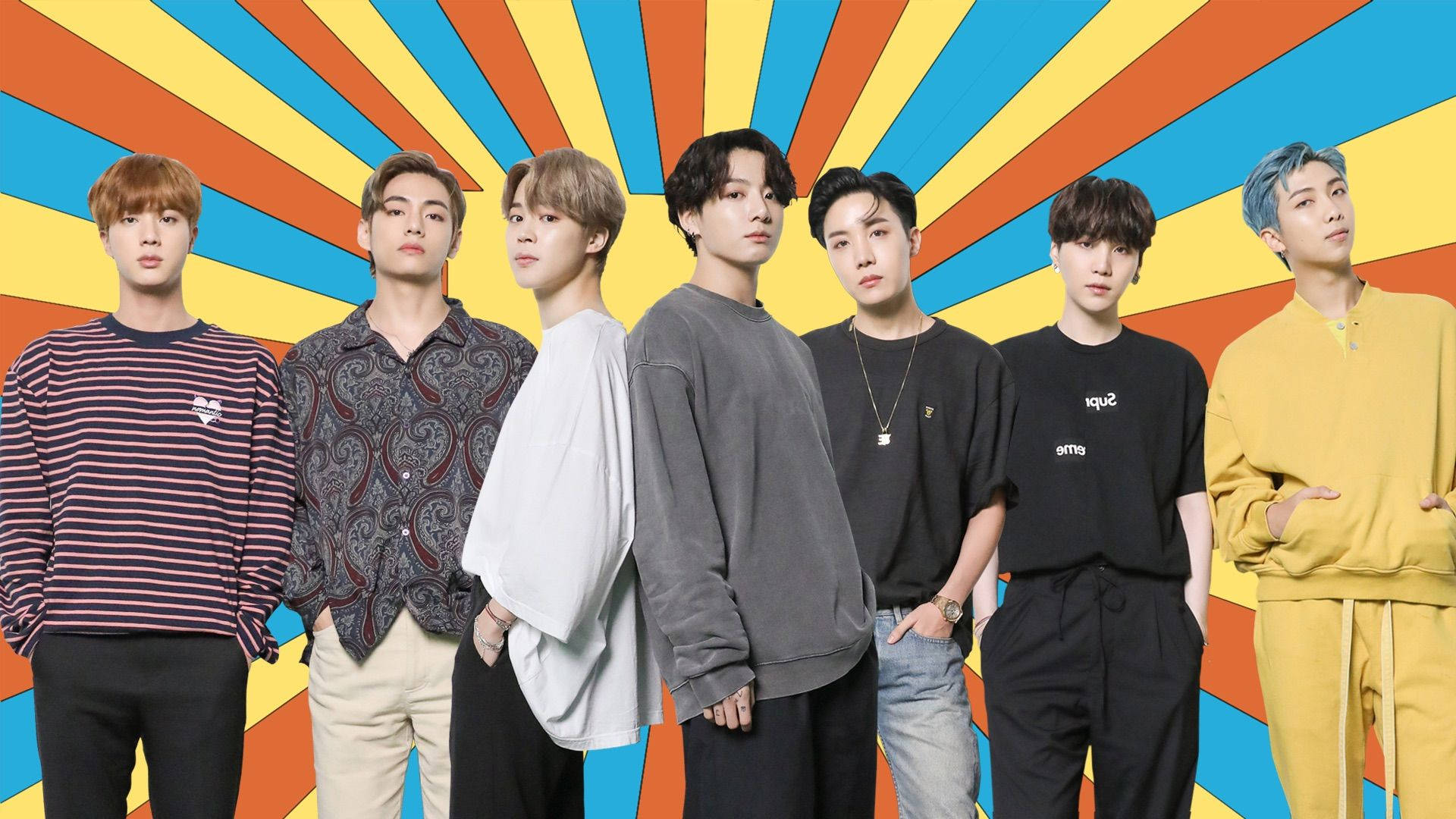 BTS 2021 桌布 壁紙 — 七位時尚年輕男士在橙、黃、藍、紅的鮮豔太陽光線背景下自信地擺姿勢。
