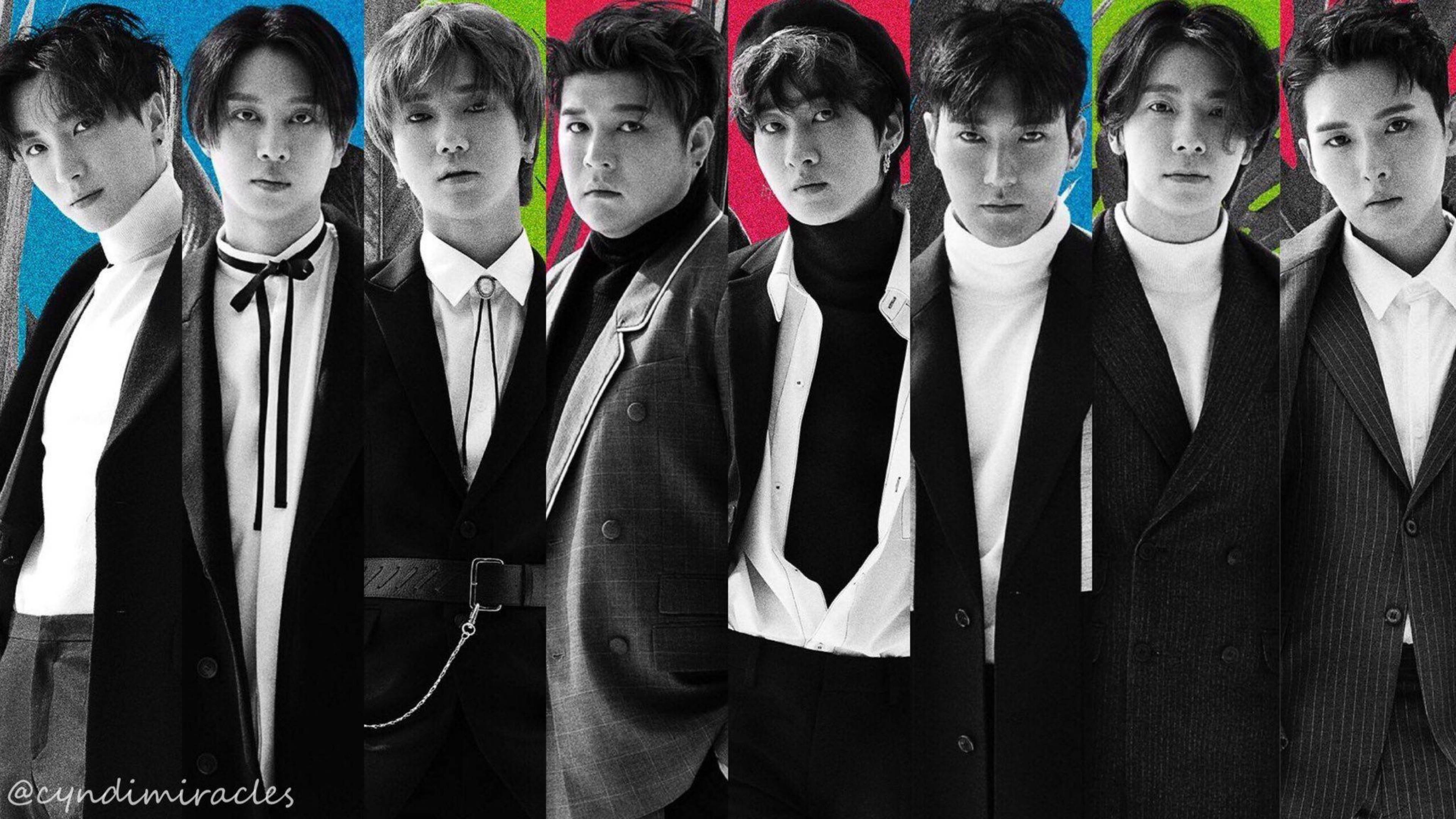 Super Junior 桌布 壁紙 — 七位身穿時尚黑白西裝的男士，在色彩鮮豔的背景前，以大膽的肖像照呈現。