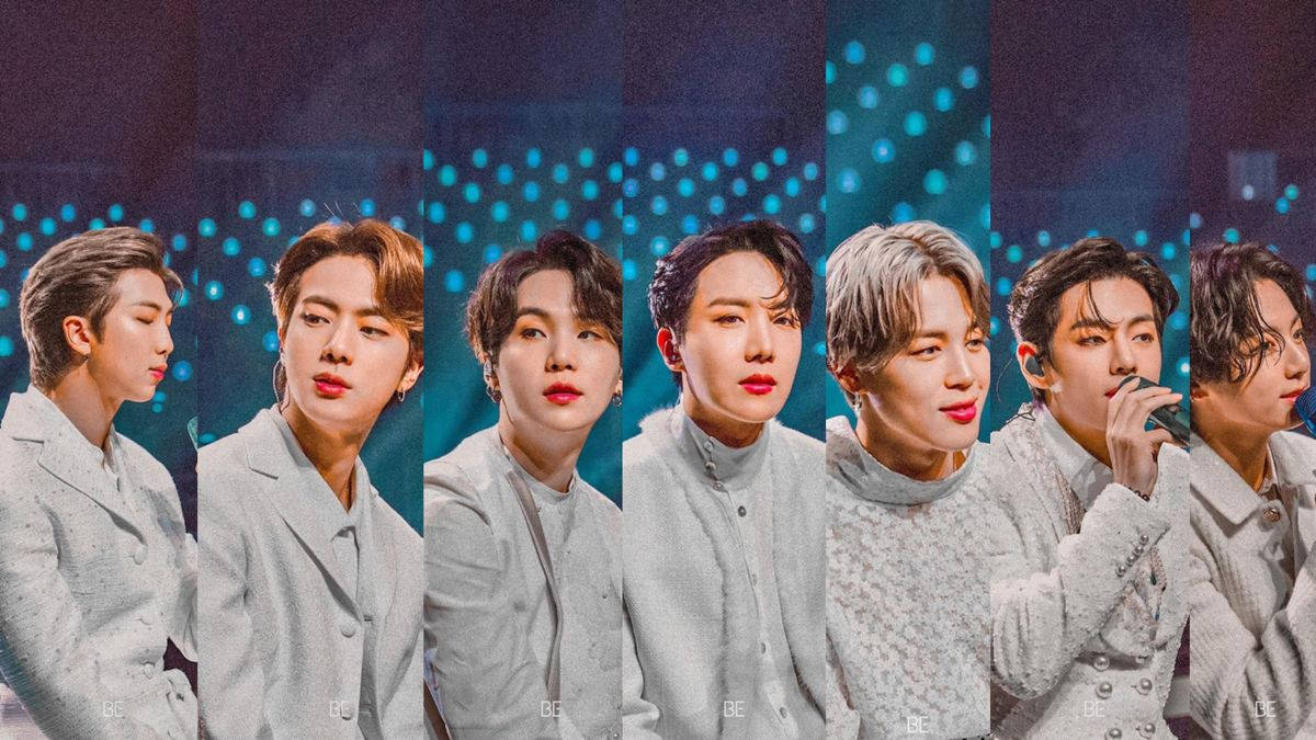 BTS 桌布 桌布 壁紙 — 七位身穿淺灰色服裝的男性K-pop偶像在藍色圓點舞台背景和閃爍燈光前擺姿勢。