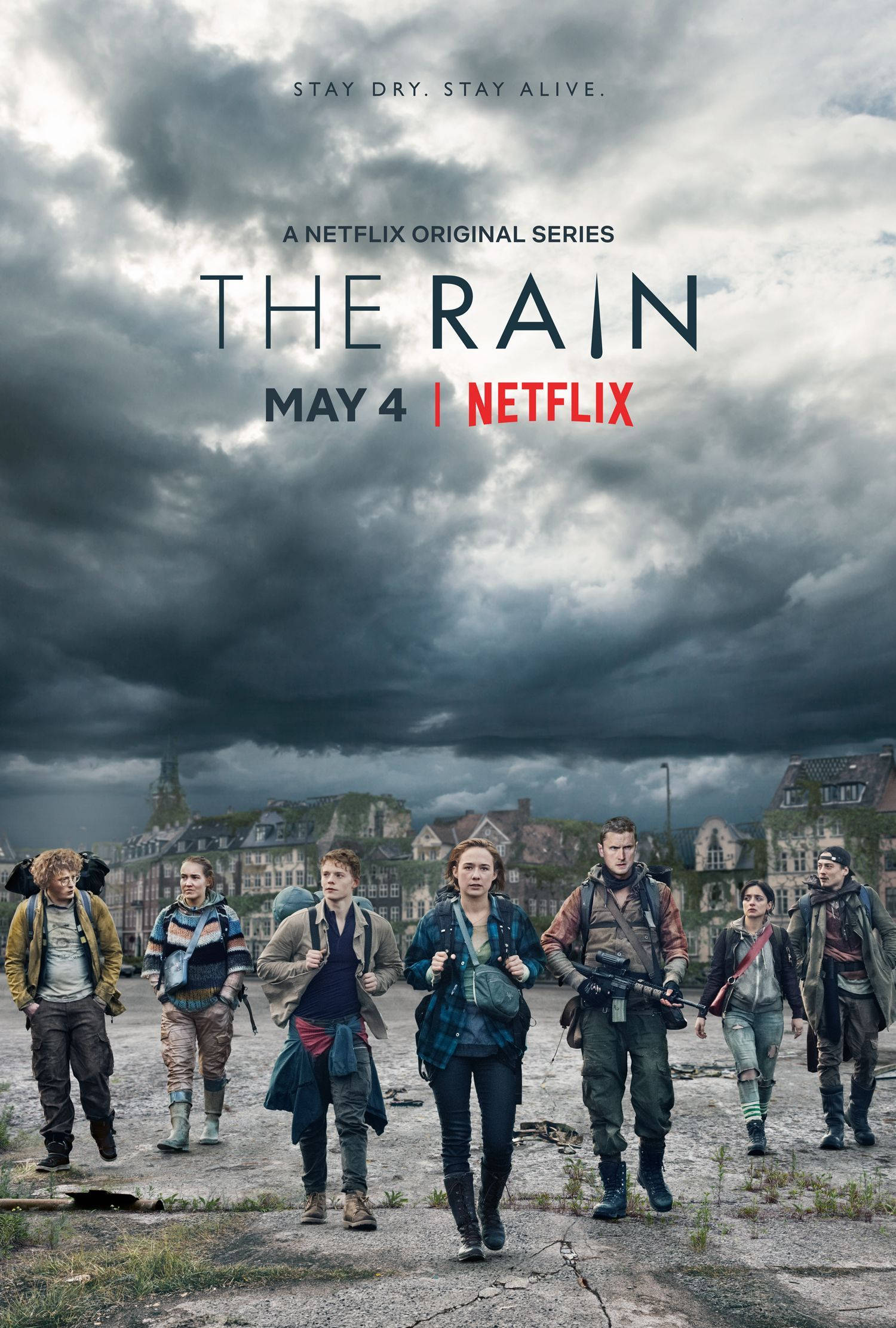 Netflix 桌布 壁紙 — 七名倖存者在風暴天空下穿越荒涼的歐洲小鎮，這是一部後末日驚悚片。
