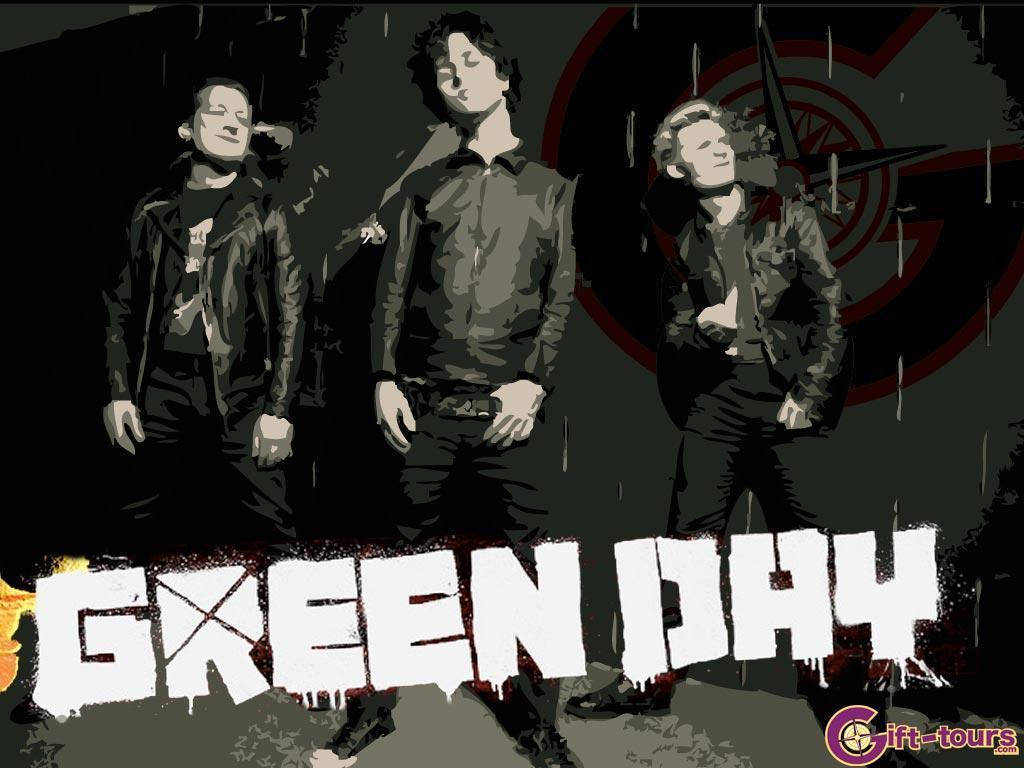 Green Day 桌布 壁紙 — 三位樂團成員站在雨中，背景黑暗，有一個紅色圓形標誌和粗體滴落的「GREEN DAY」文字。