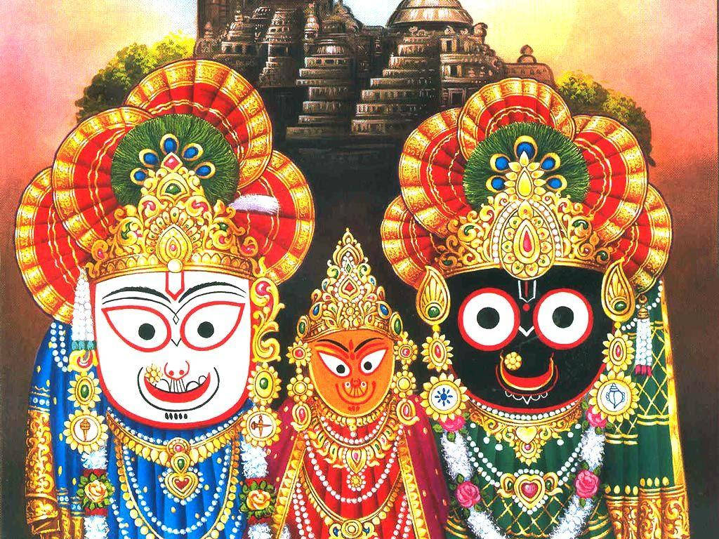 Jagannath 桌布 壁紙 — 三位裝飾華麗的印度教神祇，戴著鮮豔的頭飾和珠寶，站在寺廟前，背景是溫暖的日落天空。