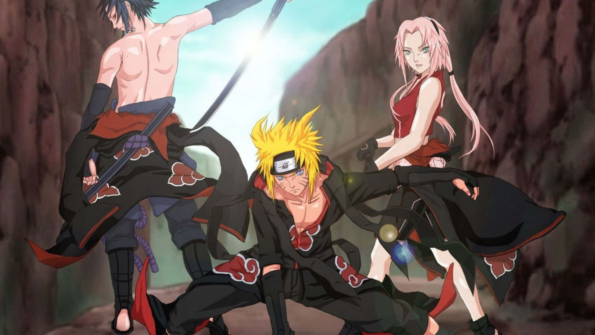 Naruto Team 7 桌布 壁紙 — 三位身穿帶有紅雲圖案黑色斗篷的動漫戰士，在明亮的天空下，動態地站立在岩石峽谷中。