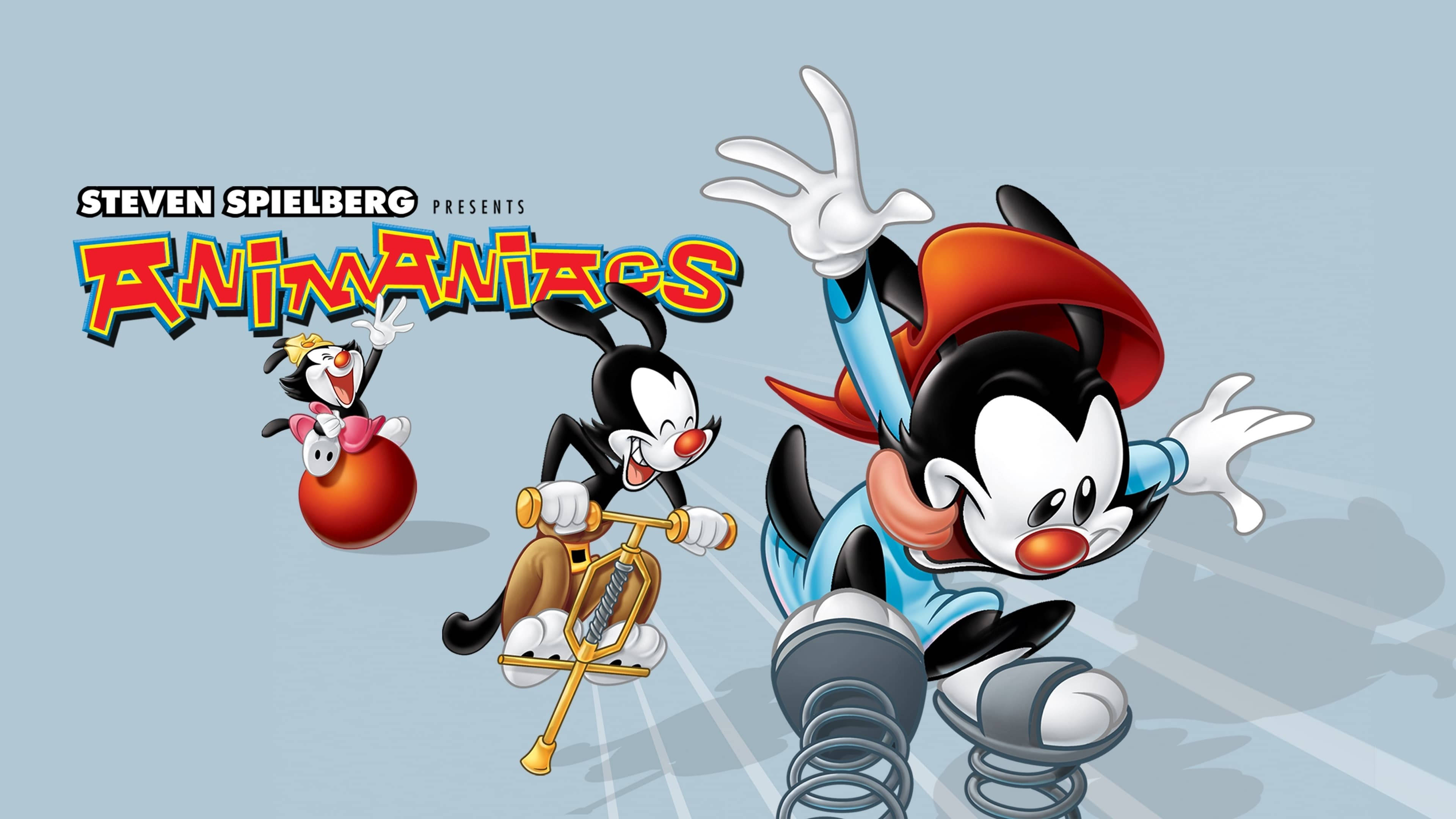 Animaniacs 桌布 壁紙 — 三個來自 Animaniacs 的動畫角色在淺藍色背景上帶有漫畫運動線條，充滿活力地奔跑。
