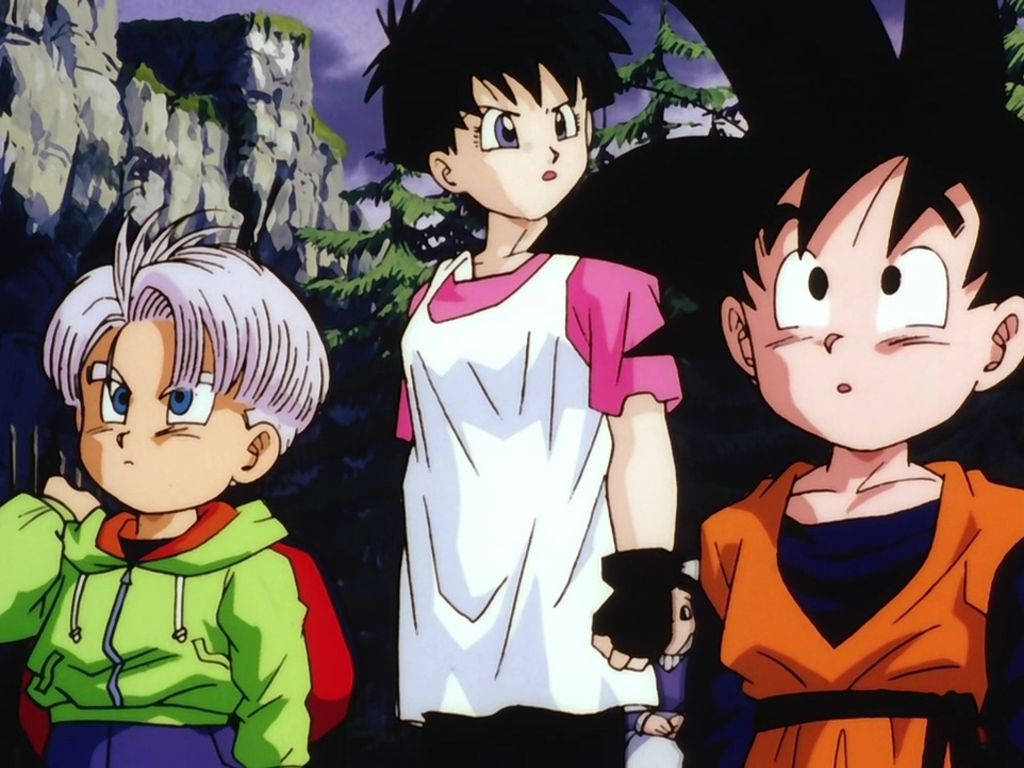 Goten 桌布 壁紙 — 三個動漫角色在黃昏時分站在岩石森林中，表情豐富。