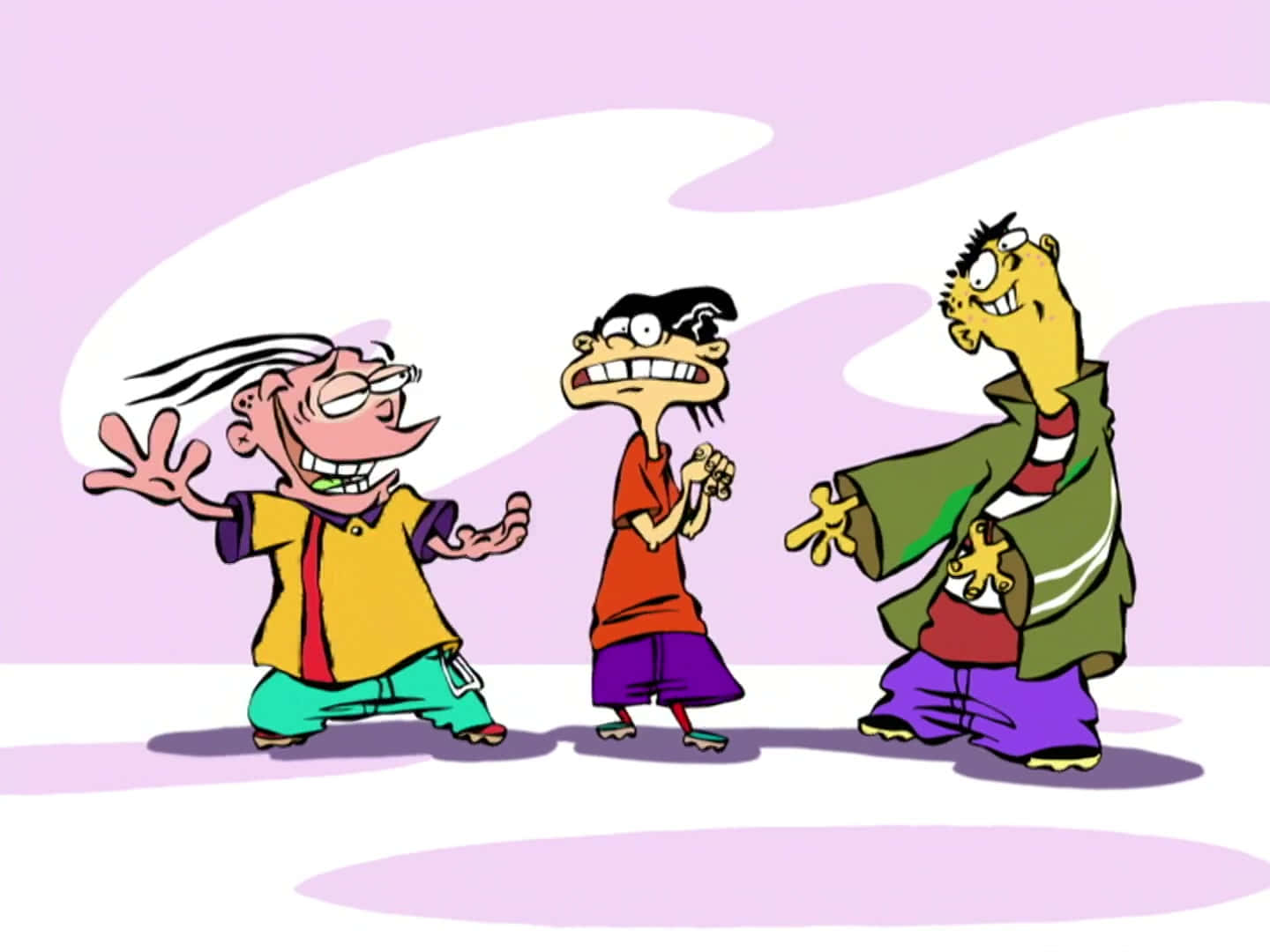 Cartoon 桌布 壁紙 — 三個卡通角色，表情誇張，服裝色彩繽紛，站在柔和的紫色背景前。