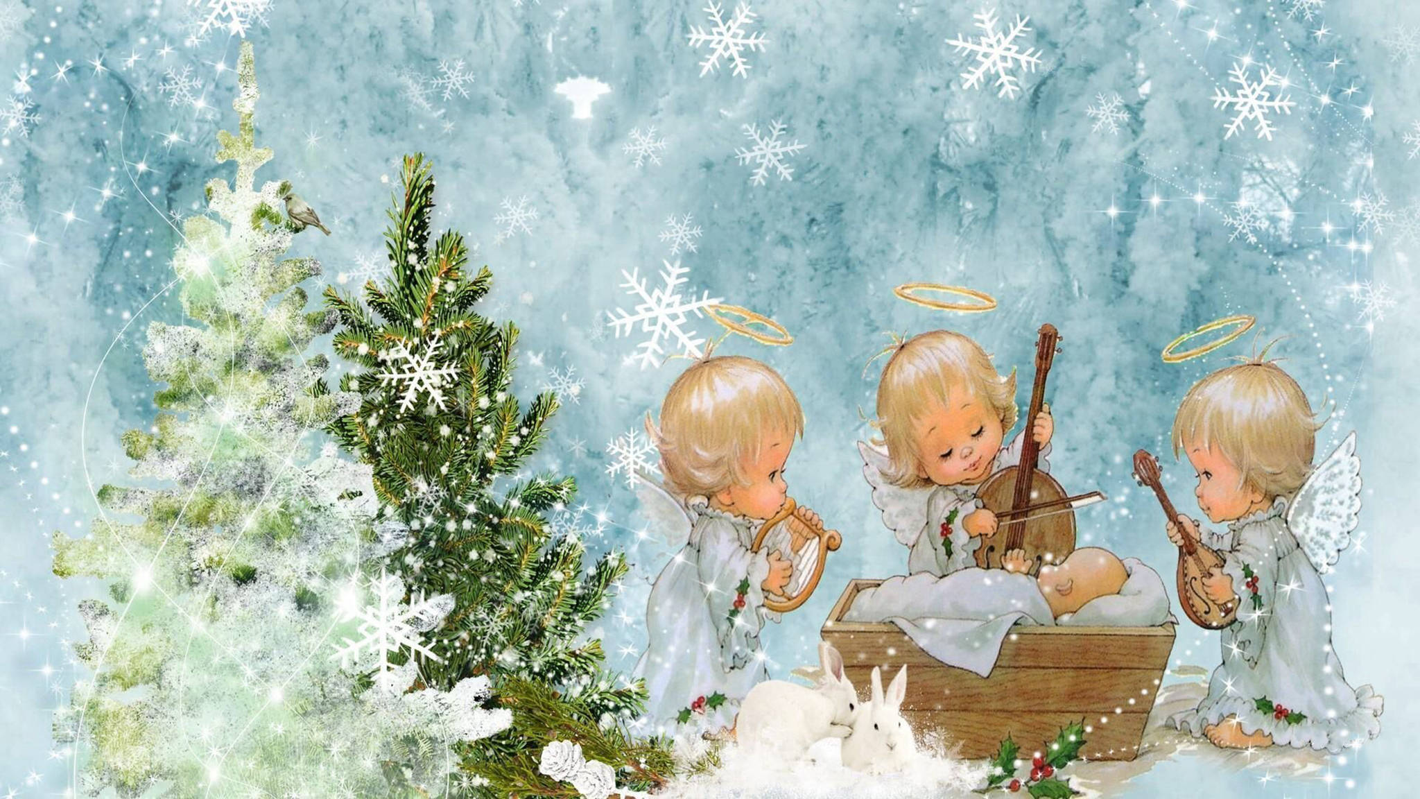 angels 桌布 壁紙 — 三個天使般的孩子在飄落的雪花下，圍繞著一個有嬰兒和兔子的馬槽演奏豎琴和小提琴。