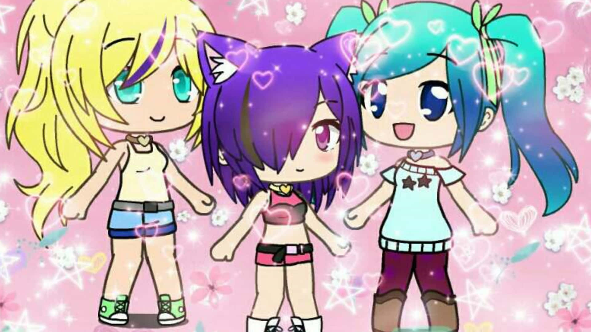 Gacha 桌布 壁紙 — 三個擁有彩色頭髮的Q版動漫女孩手牽手，站在一個充滿愛心和花朵的閃亮粉紅色背景前。
