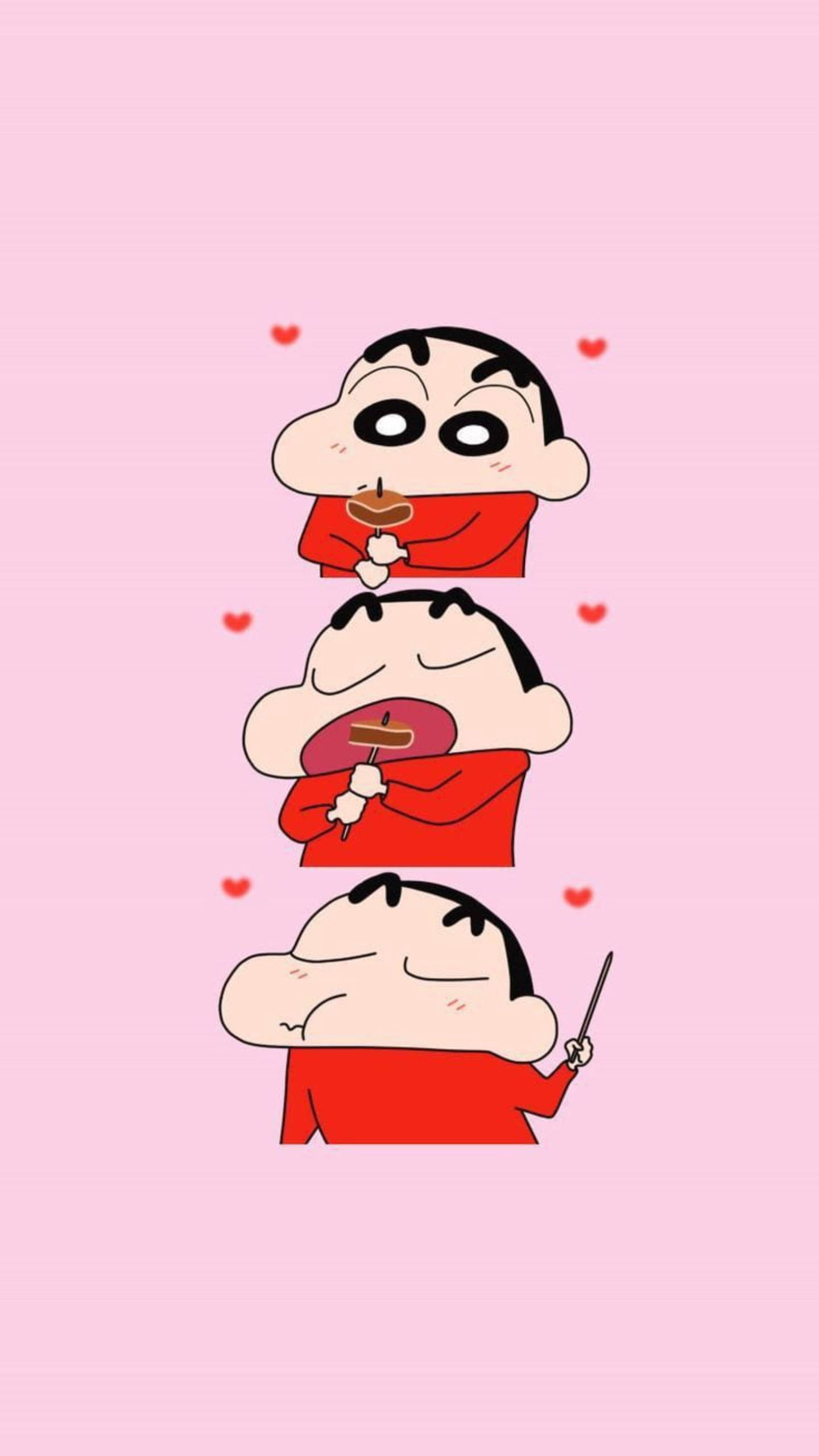 shinchan 桌布 壁紙 — 三個疊在一起的卡通人物穿著紅色襯衫，在粉紅色背景前吃零食並拿著魔杖，背景有漂浮的心形。