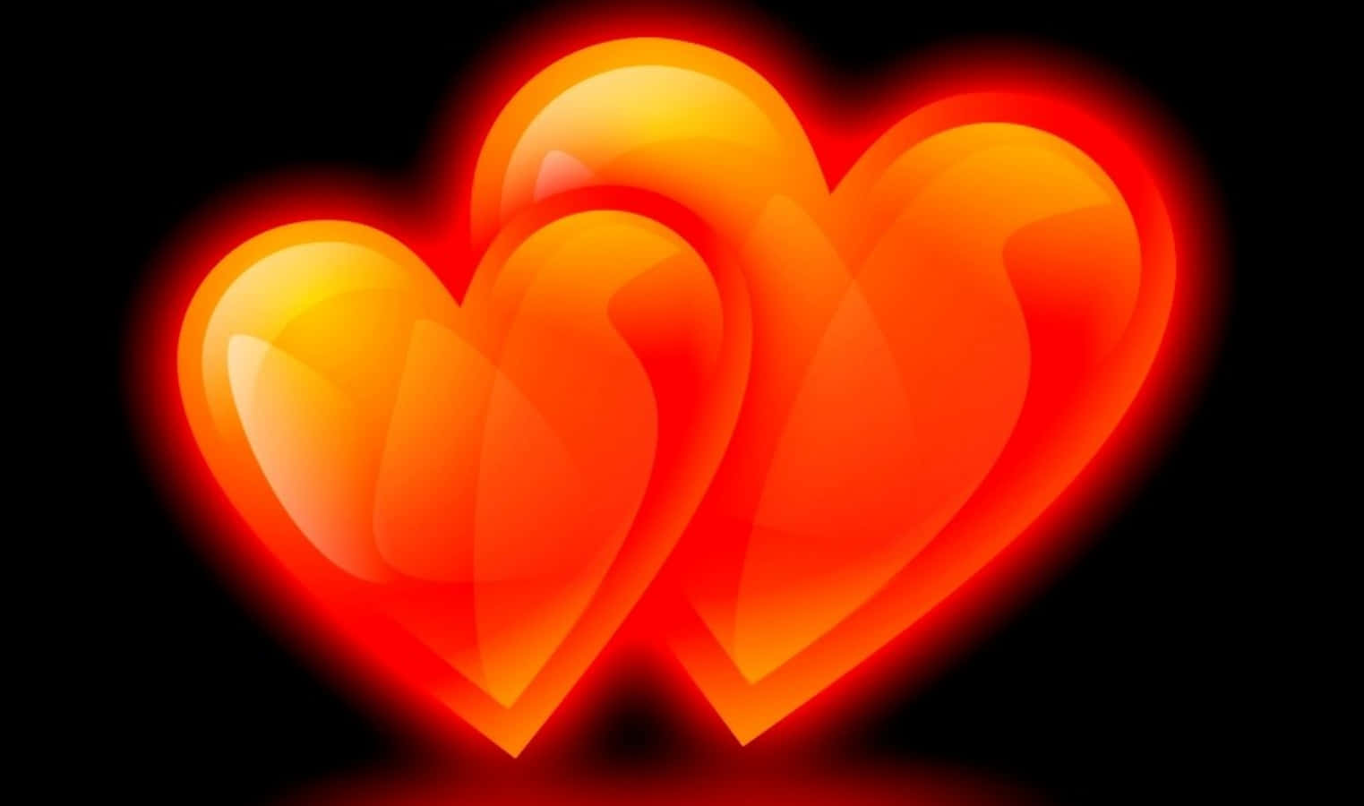 Orange Heart 桌布 壁紙 — 三個發光的半透明心形，呈現火熱的橙色和紅色，在純黑色背景上散發溫暖。