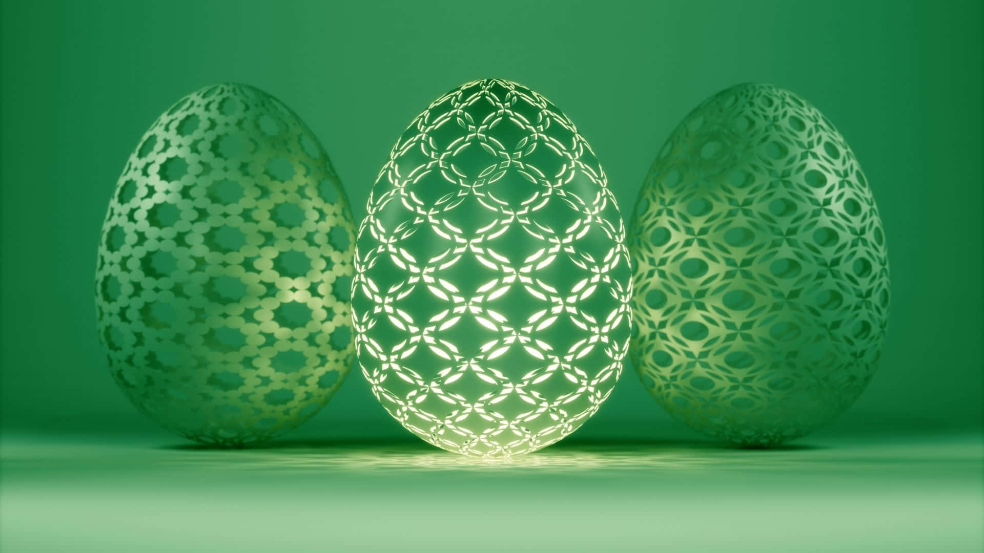 Easter Egg 桌布 壁紙 — 三個發光的綠色雞蛋，帶有複雜的幾何鏤空圖案，排列在純綠色背景上。