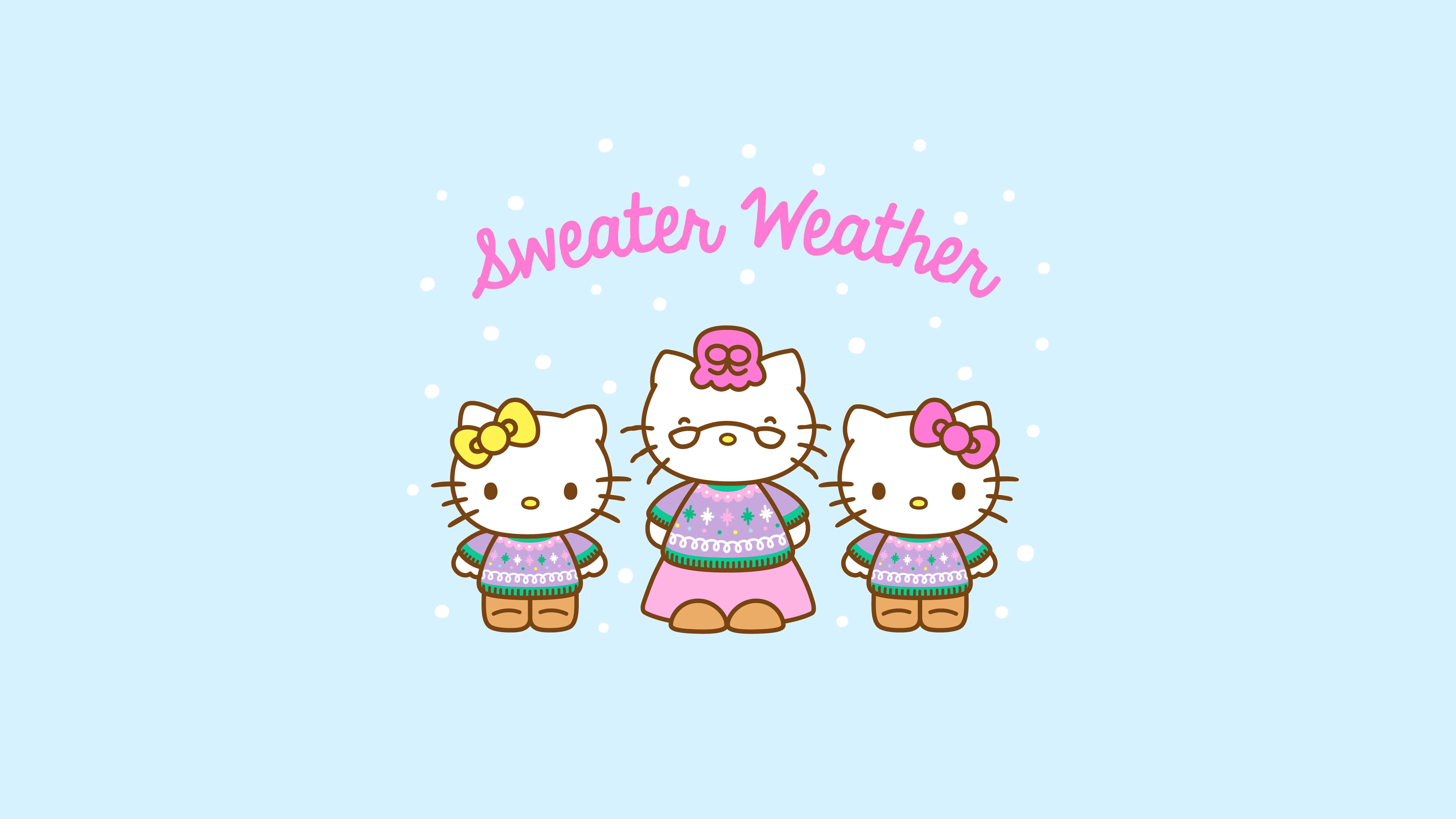 Random 桌布 壁紙 — 三個穿著舒適毛衣的Hello Kitty角色站在飄落的雪花下，背景是柔和的藍色。