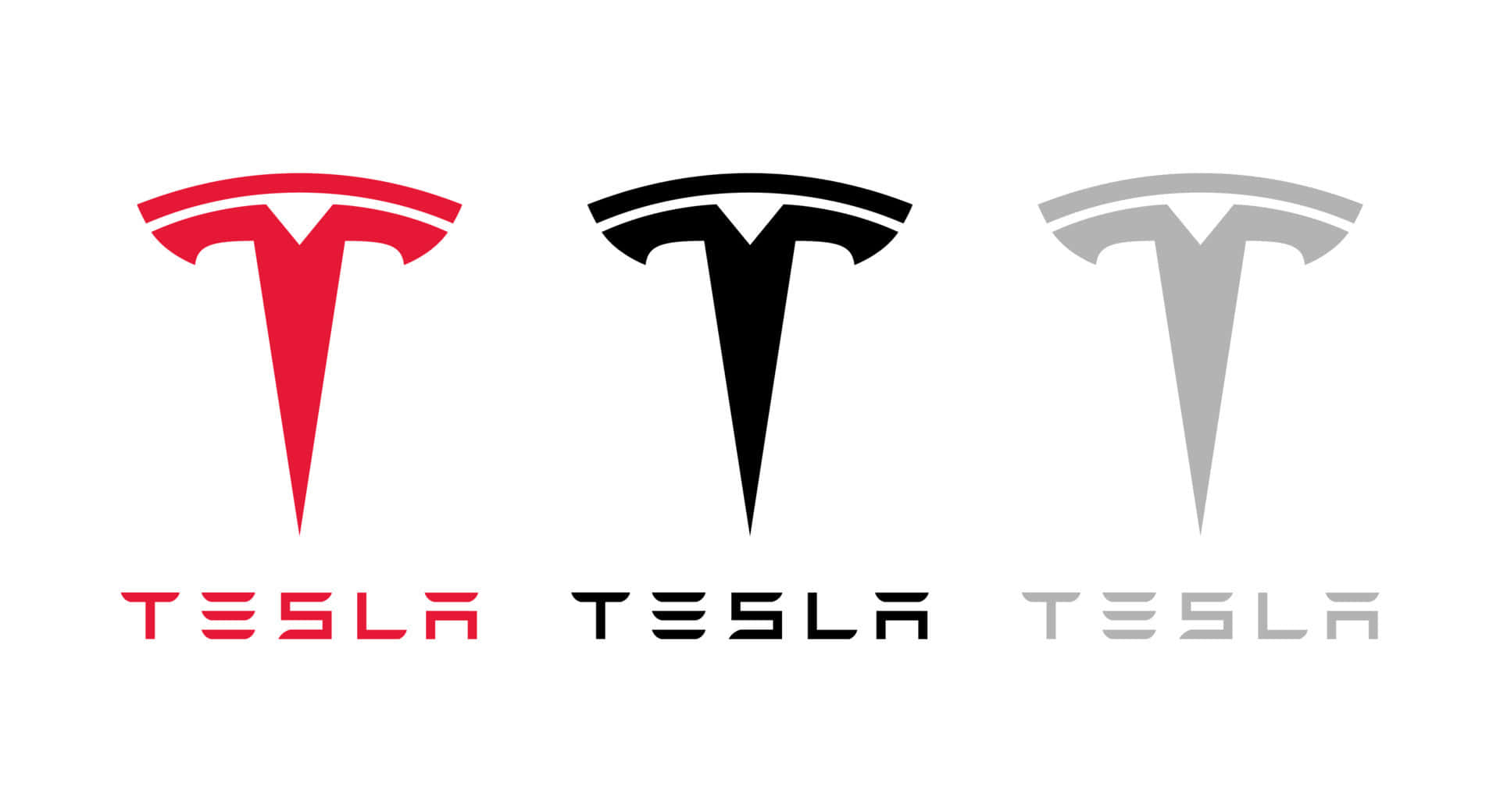 特斯拉 桌布 壁紙 — 三個紅色、黑色和灰色的 Tesla 標誌並排顯示在乾淨的白色背景上。